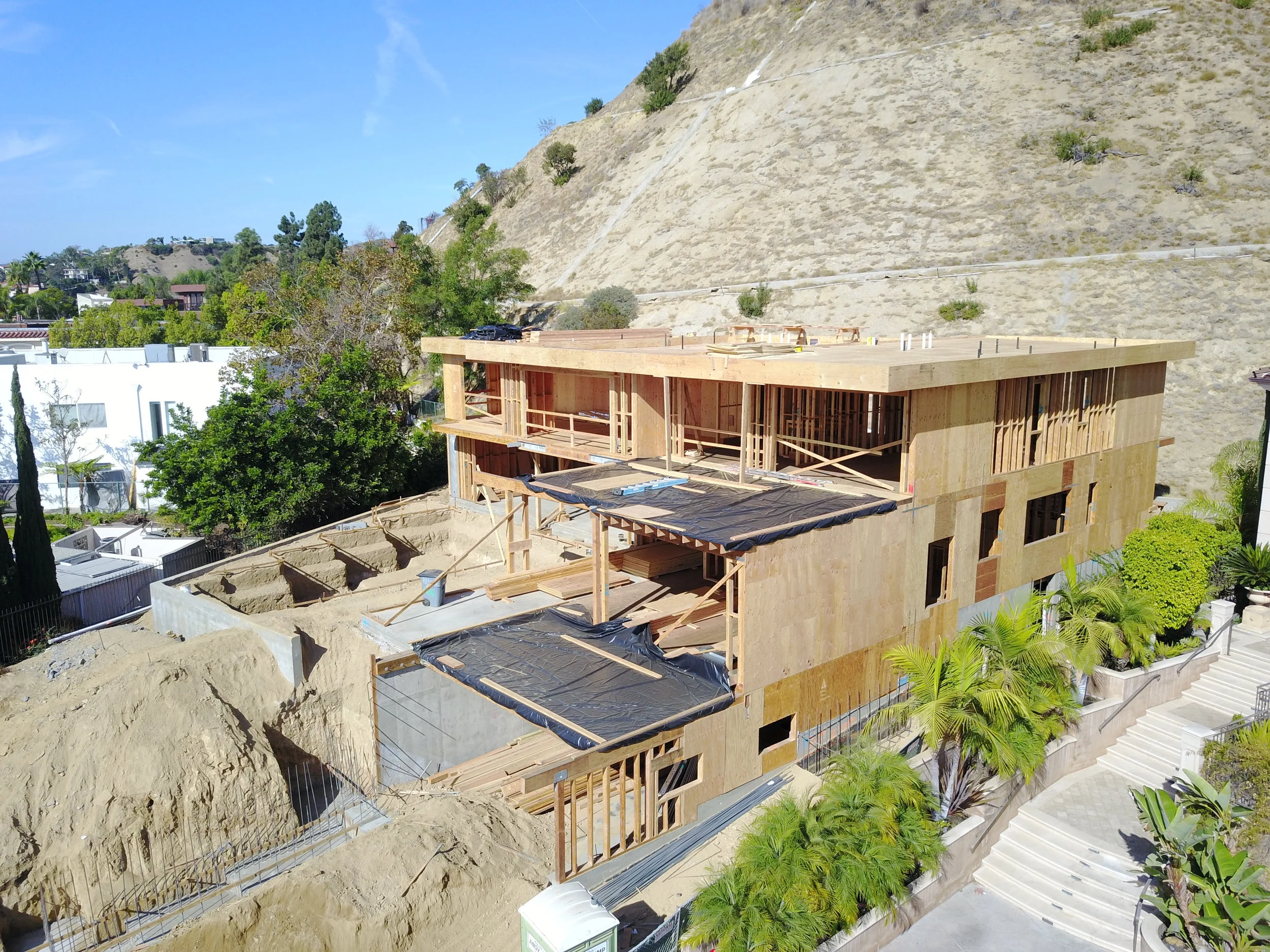 3 level, 8,000 sq ft Custom Home, perched in the hills of Grifith Park. Subterranean garage and basement, and 2 floors overlooking the Los Angeles Skyline.