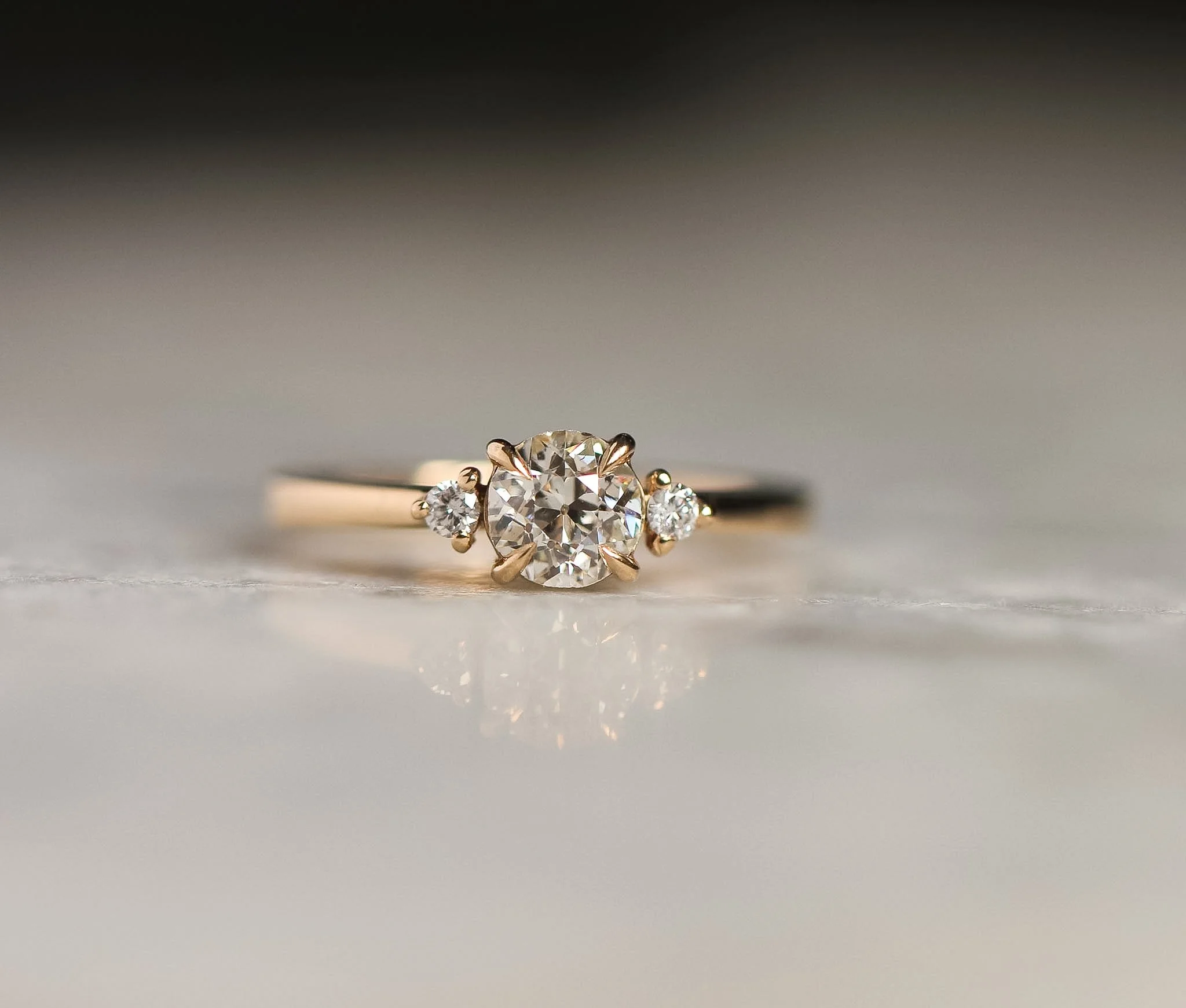 Diamond trilogy, with claw settings, the elegant tapered band gets thinner as it meets stones.