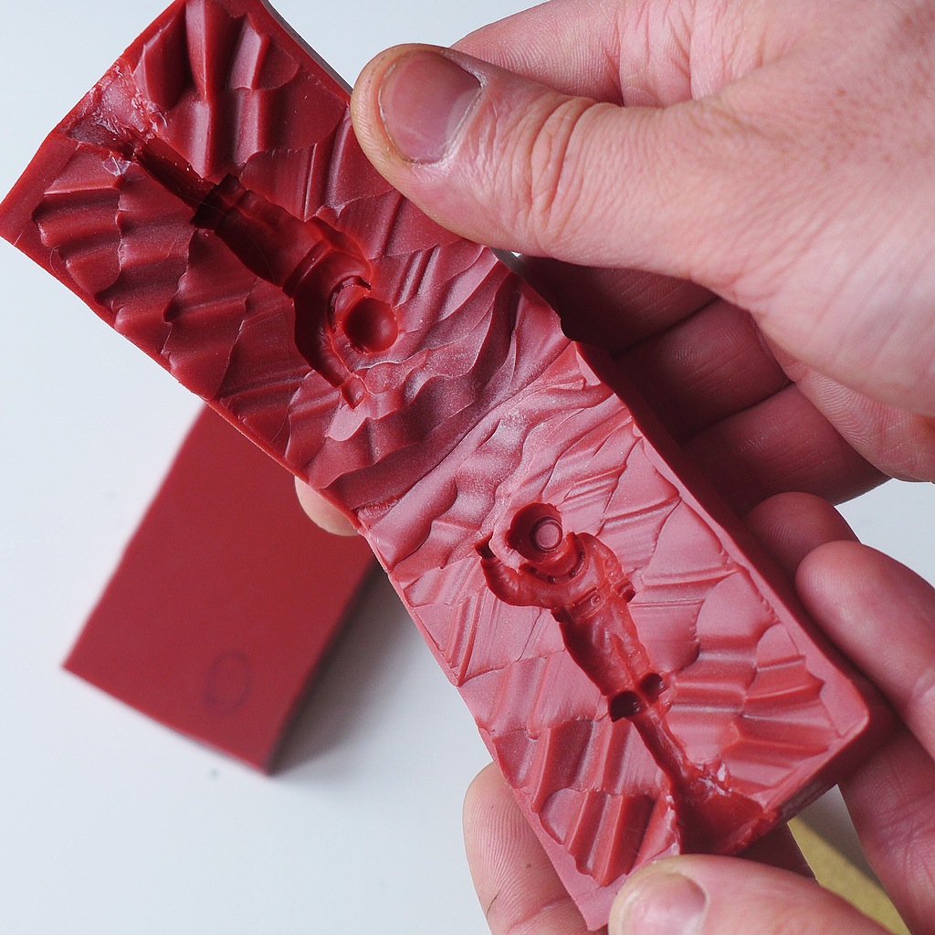 A mould of the master is taken from which precious metal castings can be made.