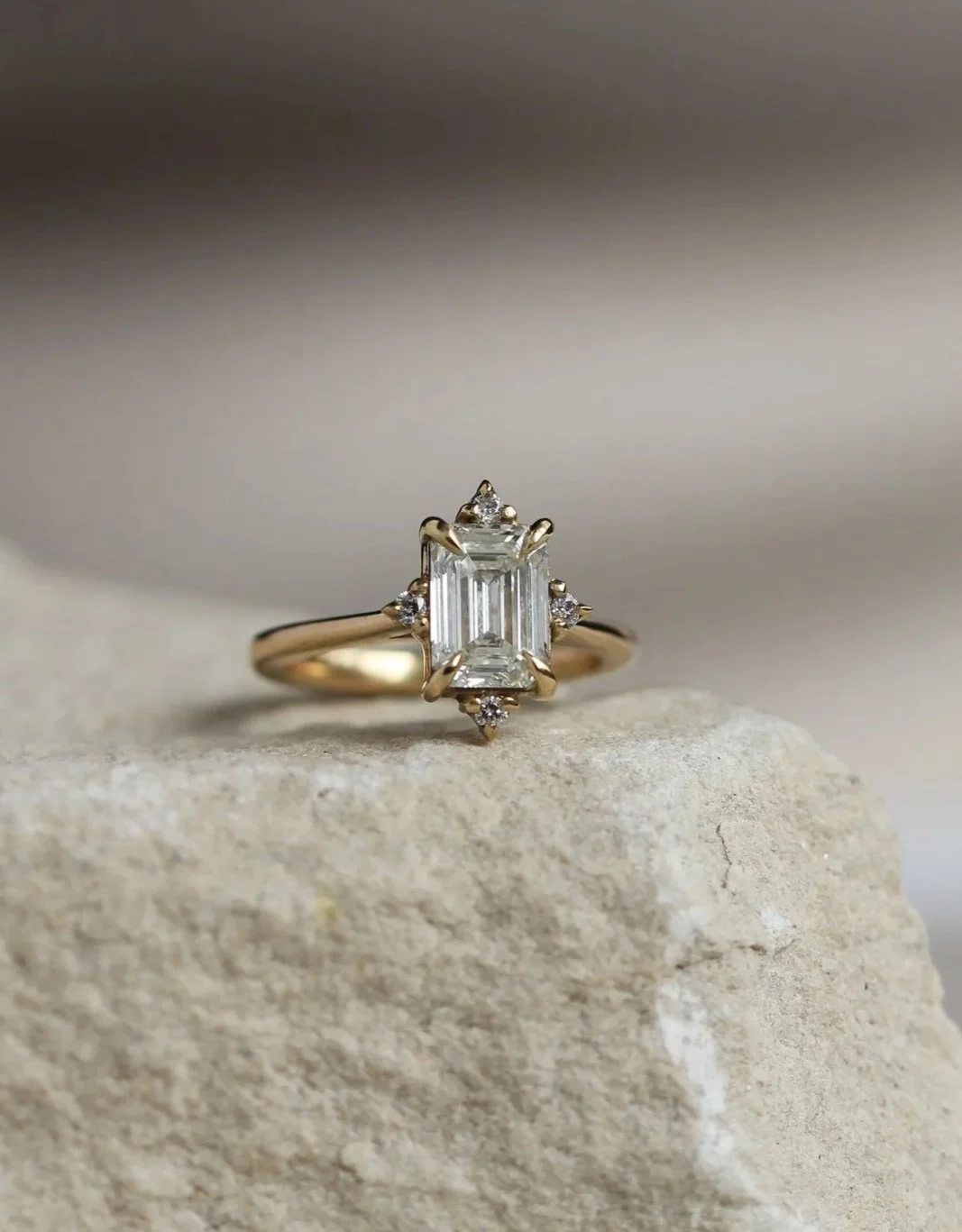 Engagement ring made with my customers own emerald cut diamond. Accent diamonds set in NSEW positions.