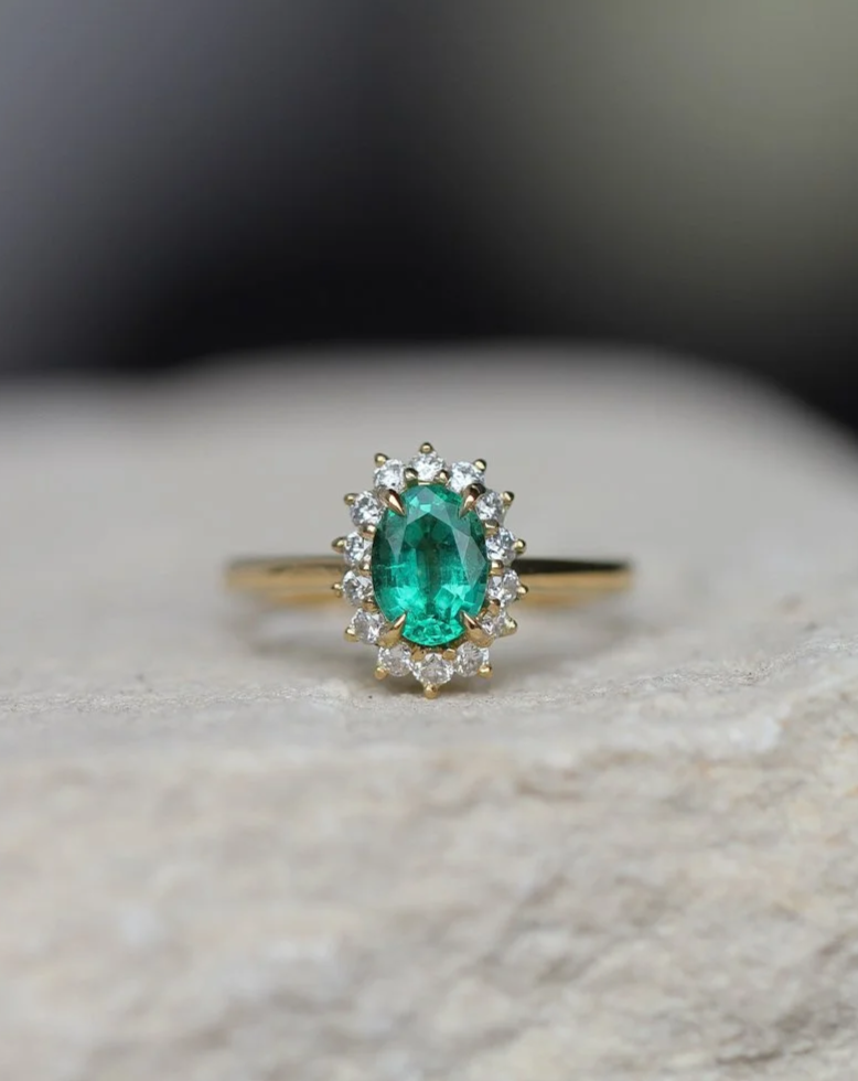 Emerald and diamond halo