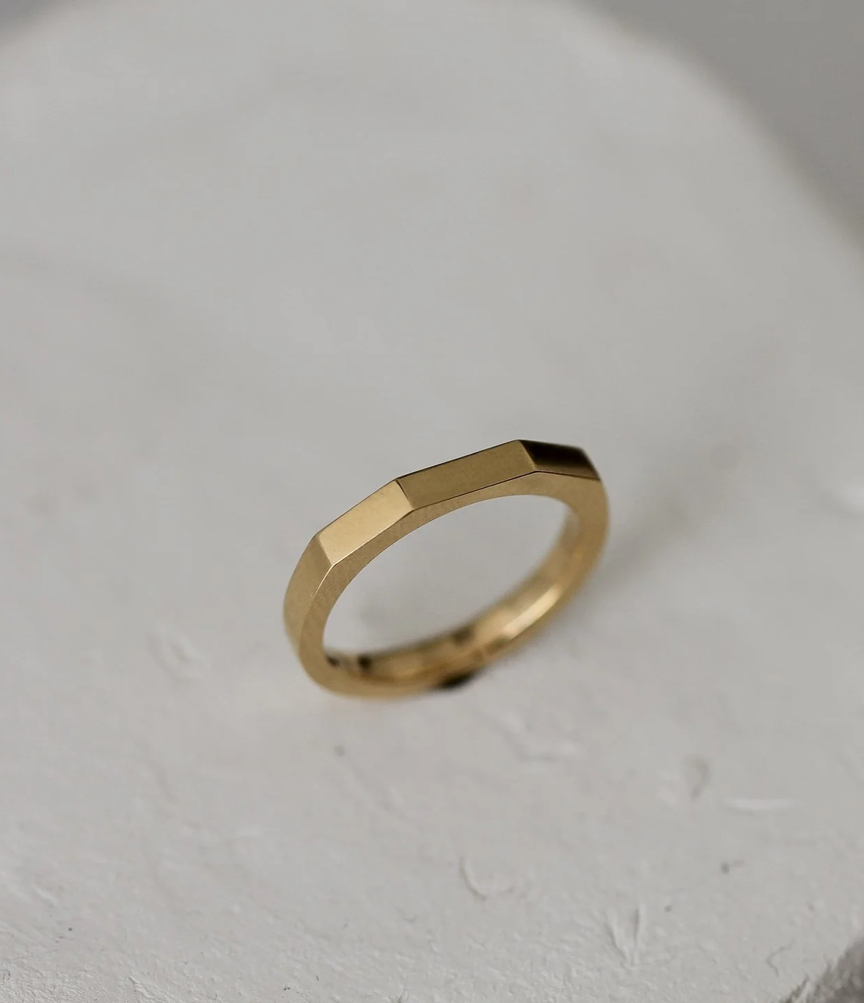 Minimalist wedding band, the flat faces match the proportions of the trilogy engagement ring it is paired with.
