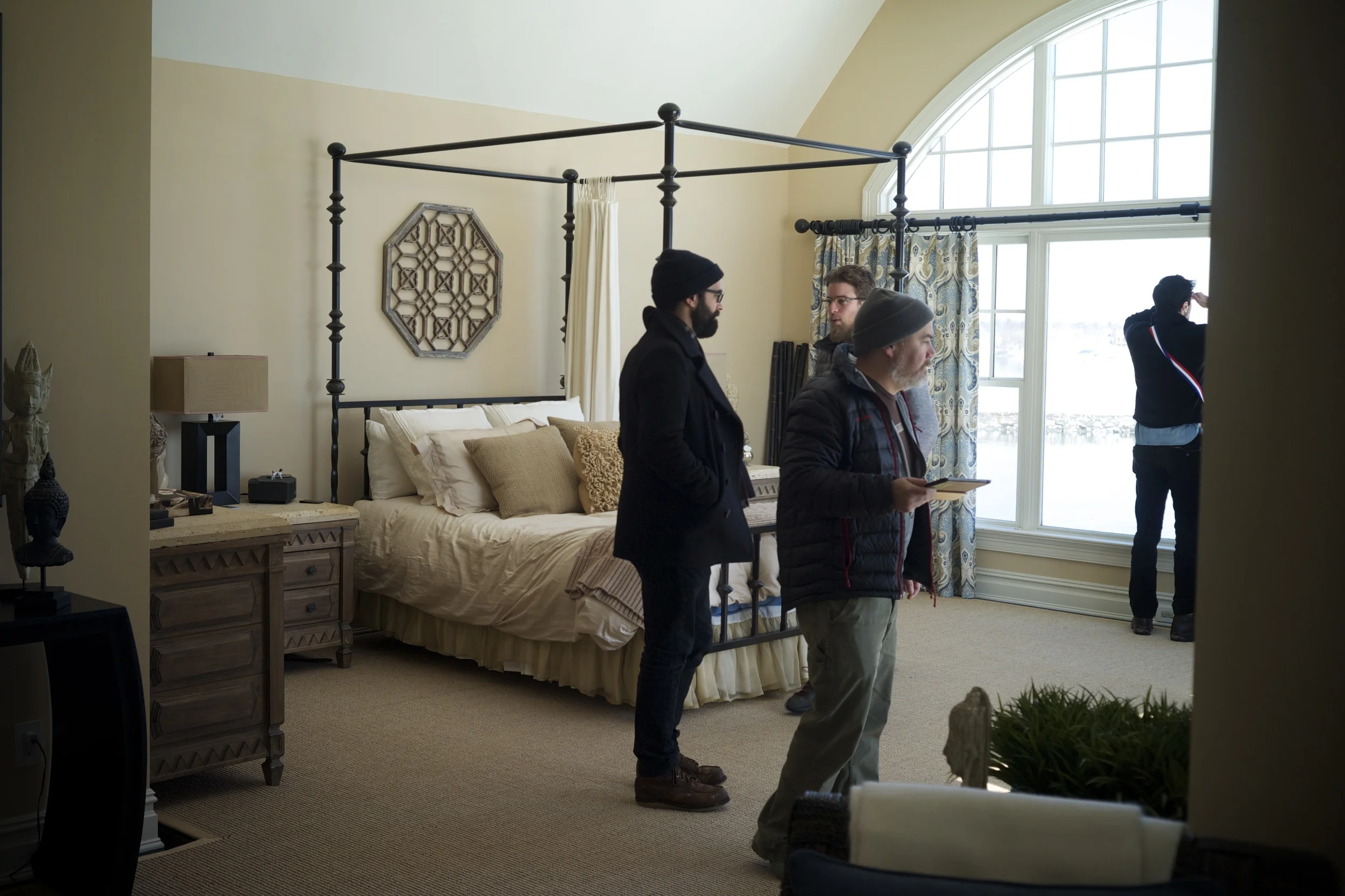 an indie band looking at real estate. notice the beards.