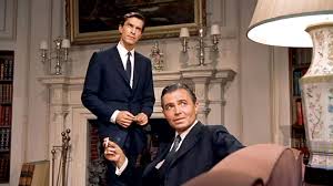 this scene from north by northwest has brilliant blocking and shot choices. this frames emphasis rodger thornhill's confusion and frustration by contrasting philip vandamm's comfort in what we believe to be his own space. is it a great photograph? not really.... but it serves its function and its part of a great sequence of shots.