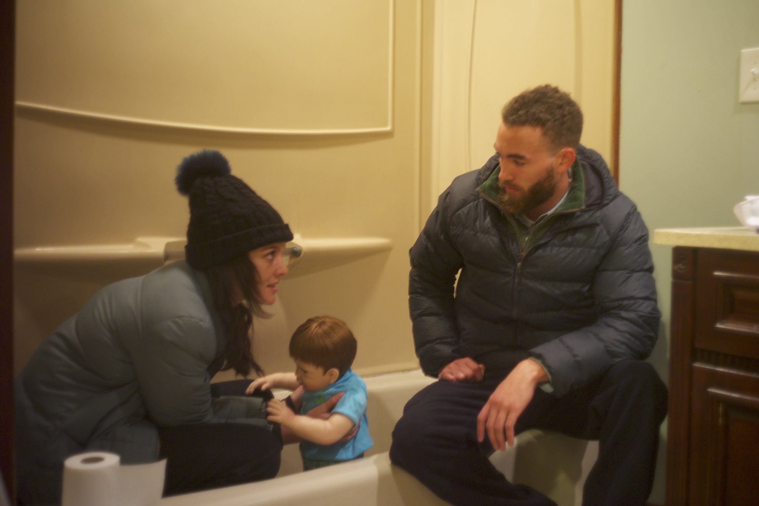 in the following scene the child was to be taken out of the bath by the parents and rolled up like a cute toddler burrito. i watch this scene rehearsed without problems... of course with the doll.