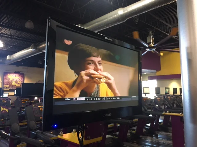 woman shoving bread in face. its from panera bread commercial i shot. 