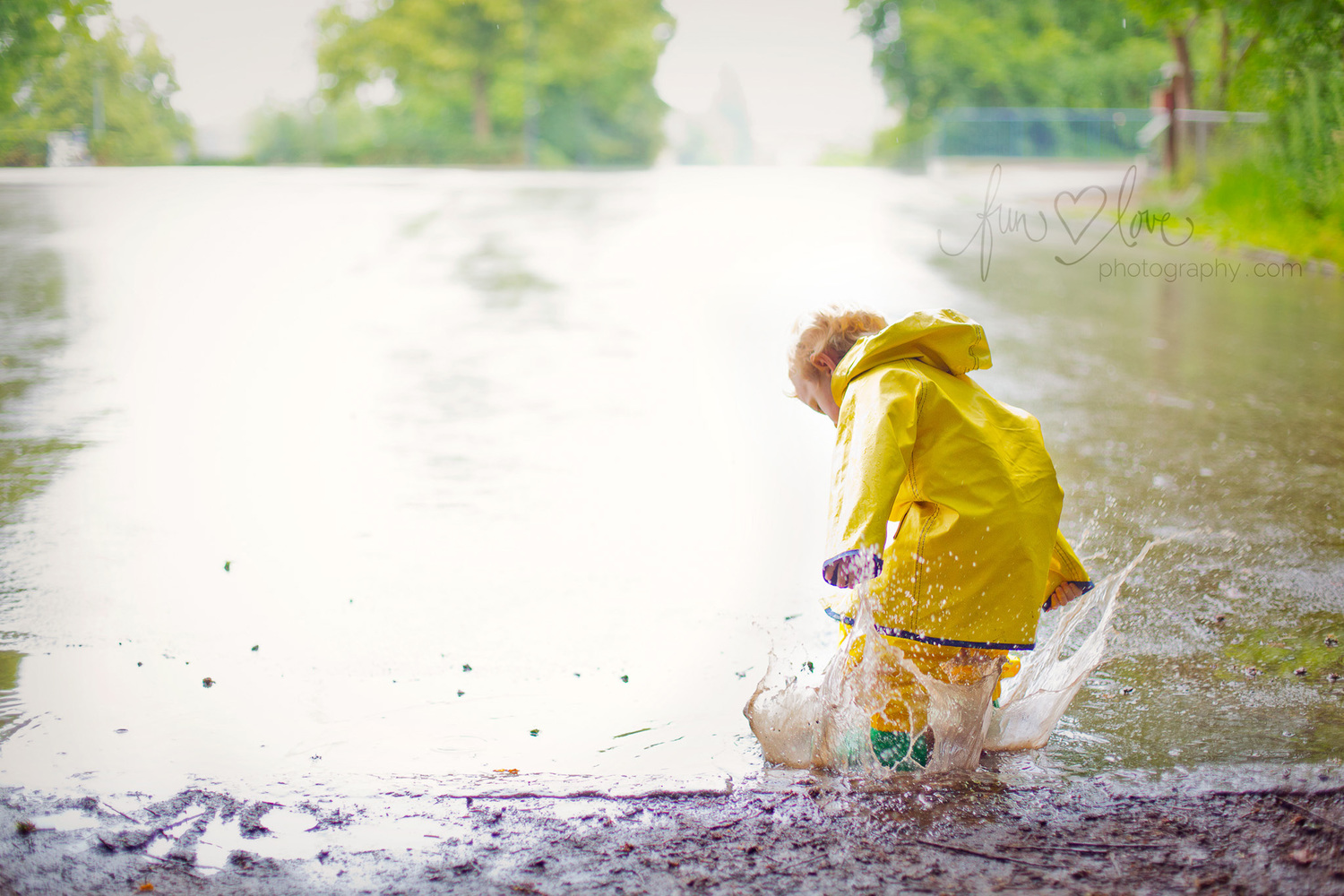 Boy Jumping in Puddle Child Photography