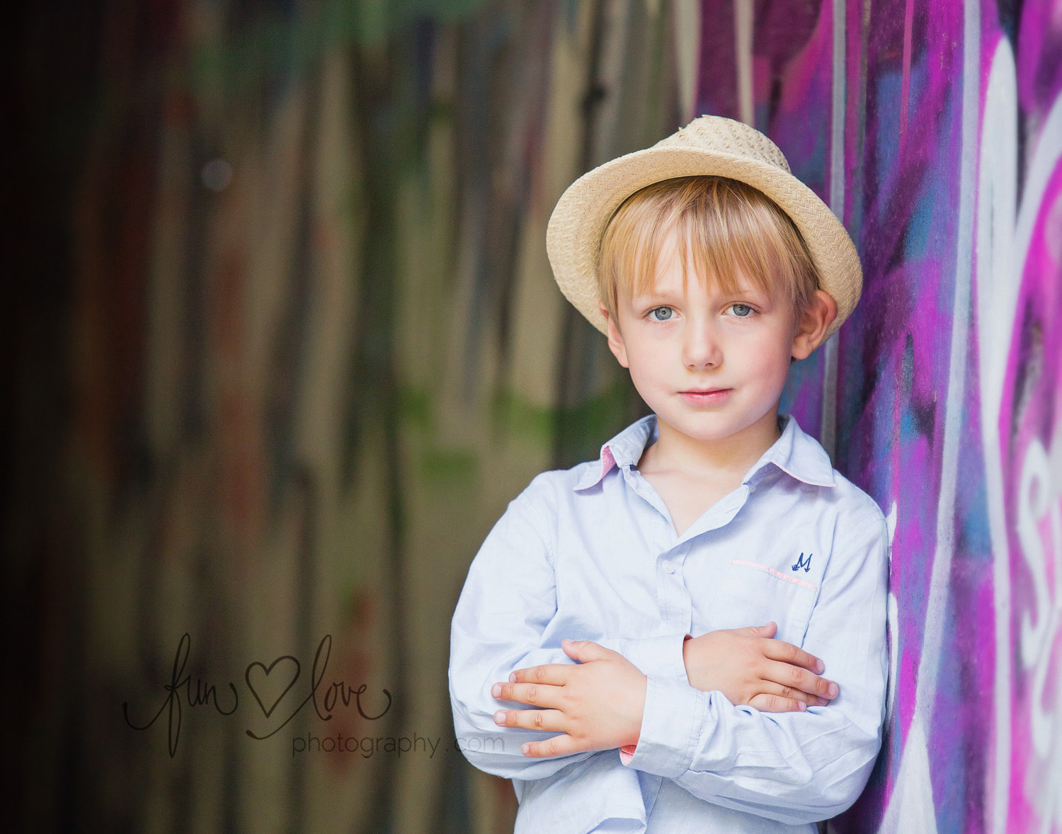 boy-in-hat-by-grafitti-wall-toronto-child-photography
