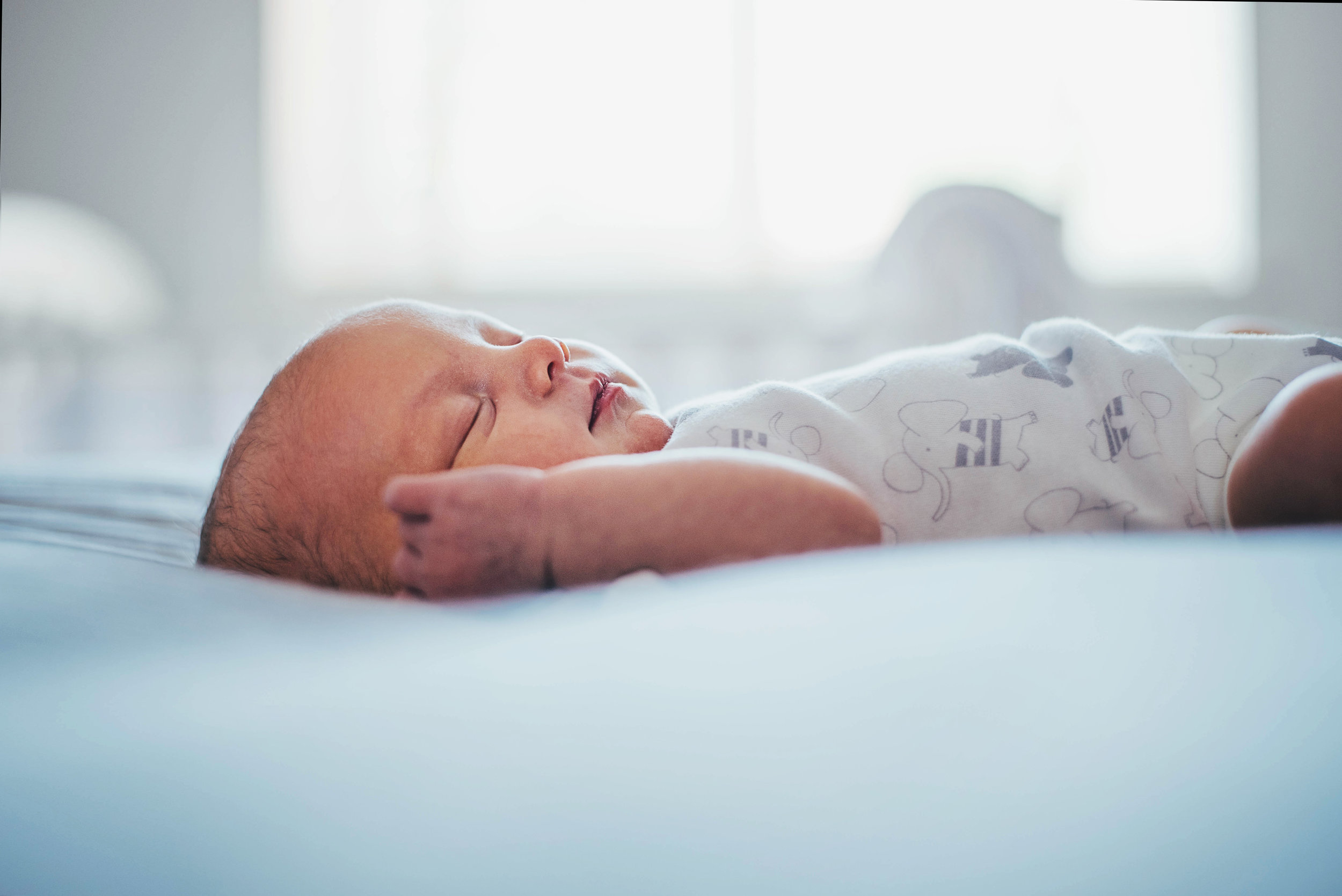 Newborn baby girl At Home Lifestyle Shoot Essex UK Documentary Portrait Photographer