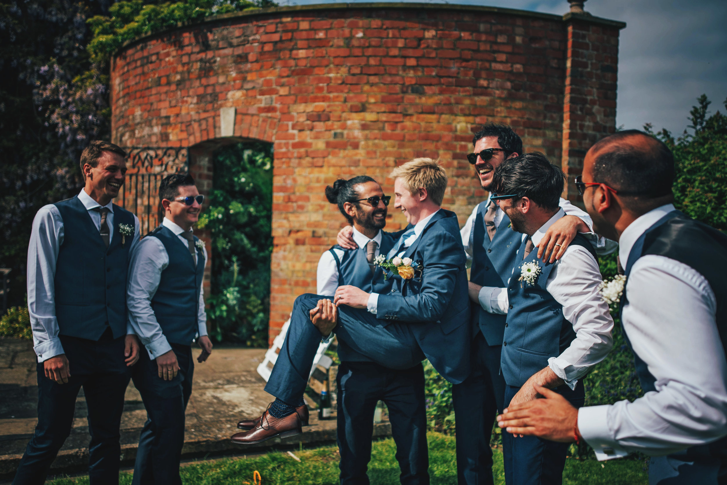 Groomsman picks up Groom at Stratford Upon Avon Town Hall Tipi Wedding Essex UK Documentary Photographer