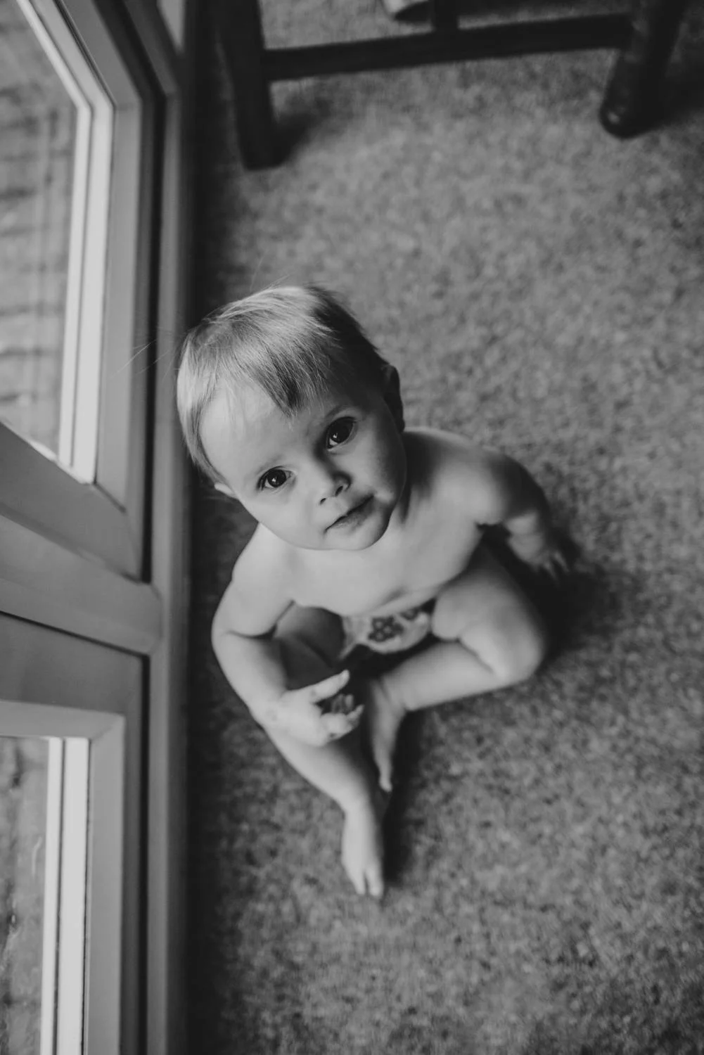 Baby girls 1st birthday at home lifestyle session. Essex UK Documentary Photographer.