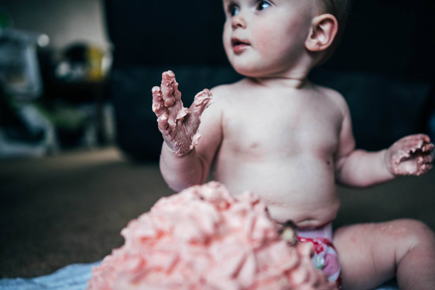 Baby girls 1st birthday at home lifestyle session. Essex UK Documentary Photographer.