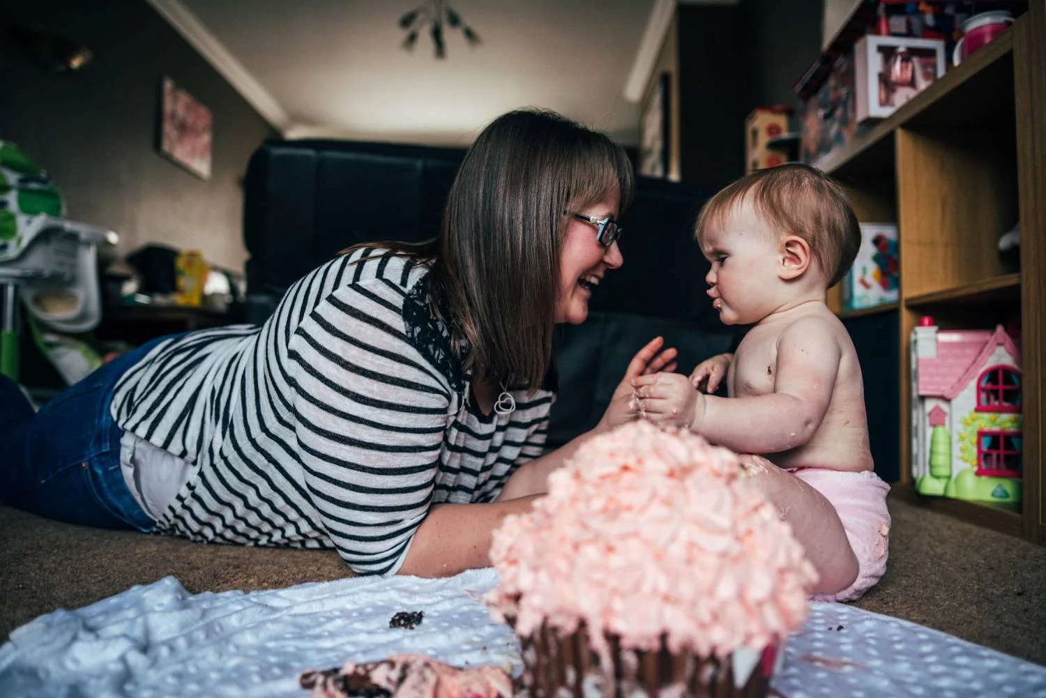 Baby girls 1st birthday at home lifestyle session. Essex UK Documentary Photographer.