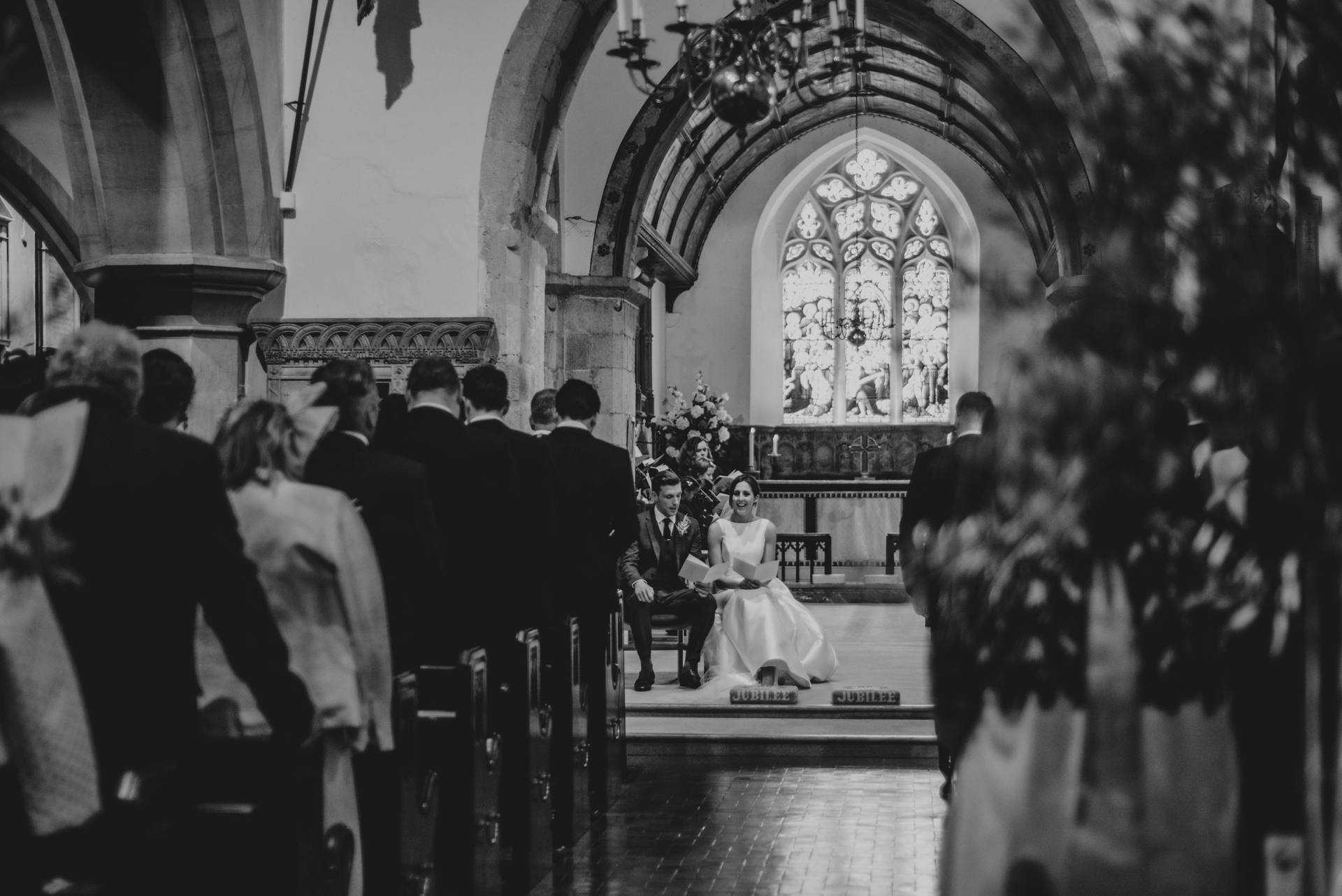 Stylish Elegant DIY Village Hall White and Green Wedding Bride wears Pronovias Three Flowers Photography Essex UK Documentary Wedding Photographer