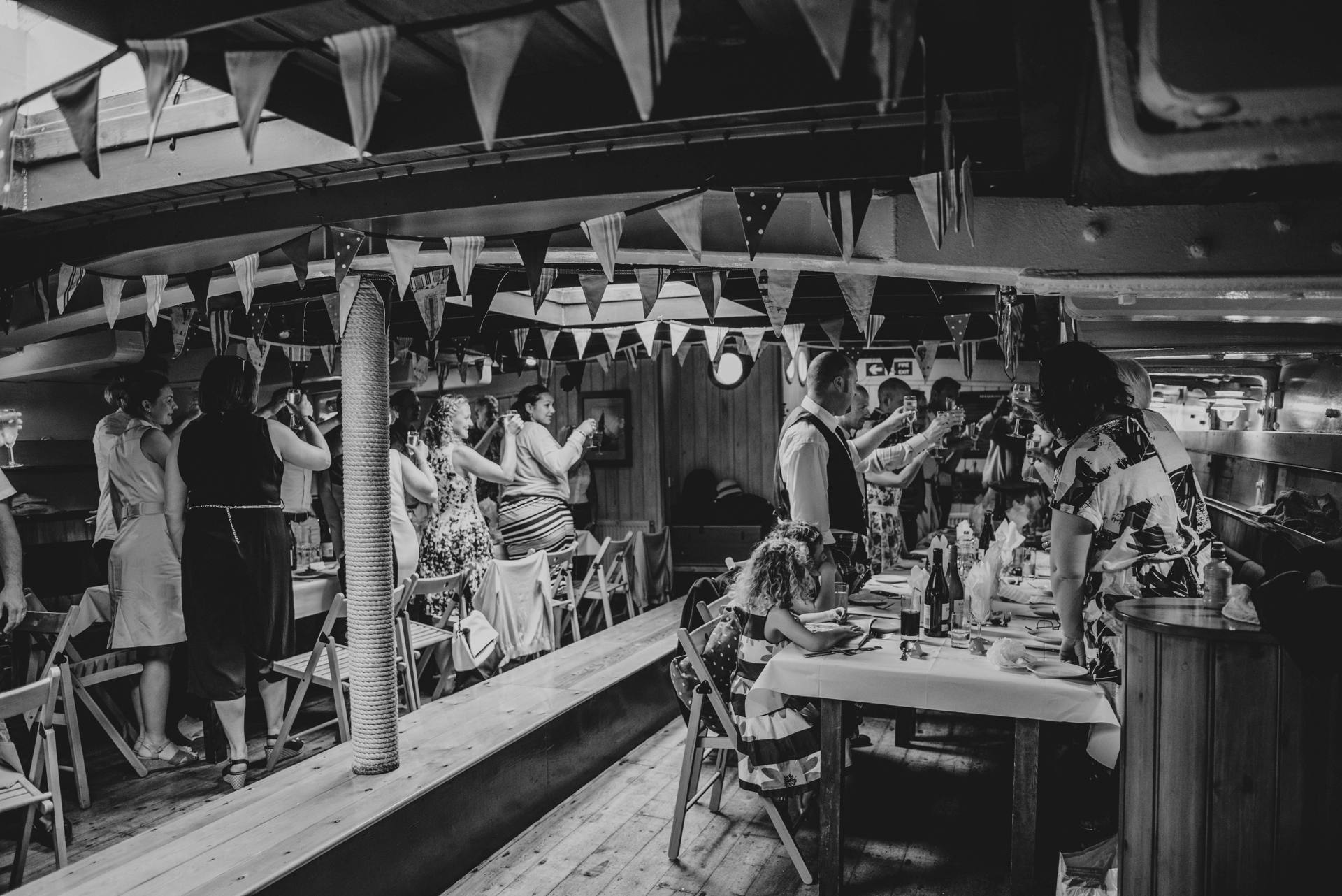 Alternative diy wedding on a boat with steam fairground Essex UK Documentary Wedding Photographer