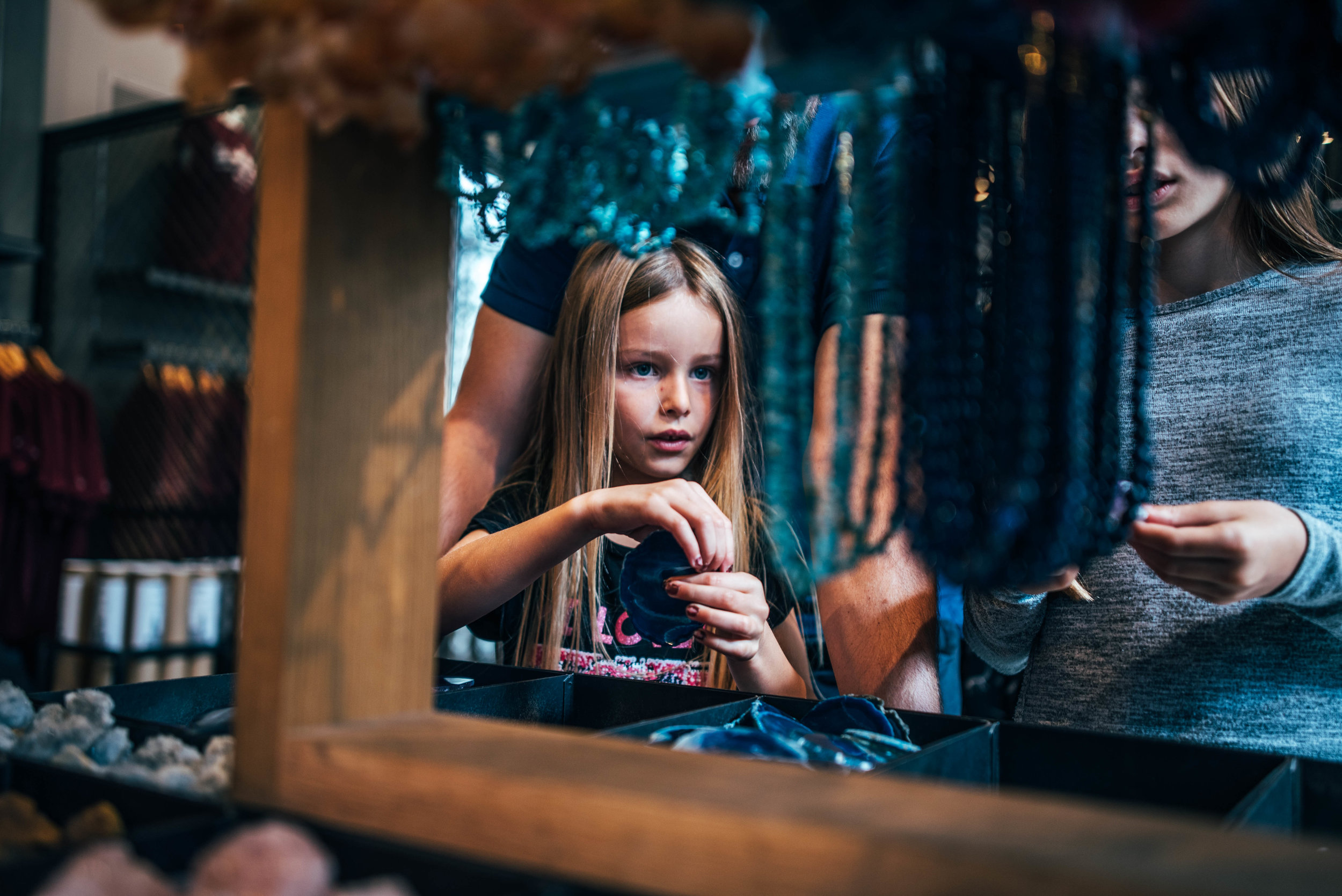 Young girl in shop at London Natural History Museum Essex UK Documentary Lifestyle Wedding Photographer