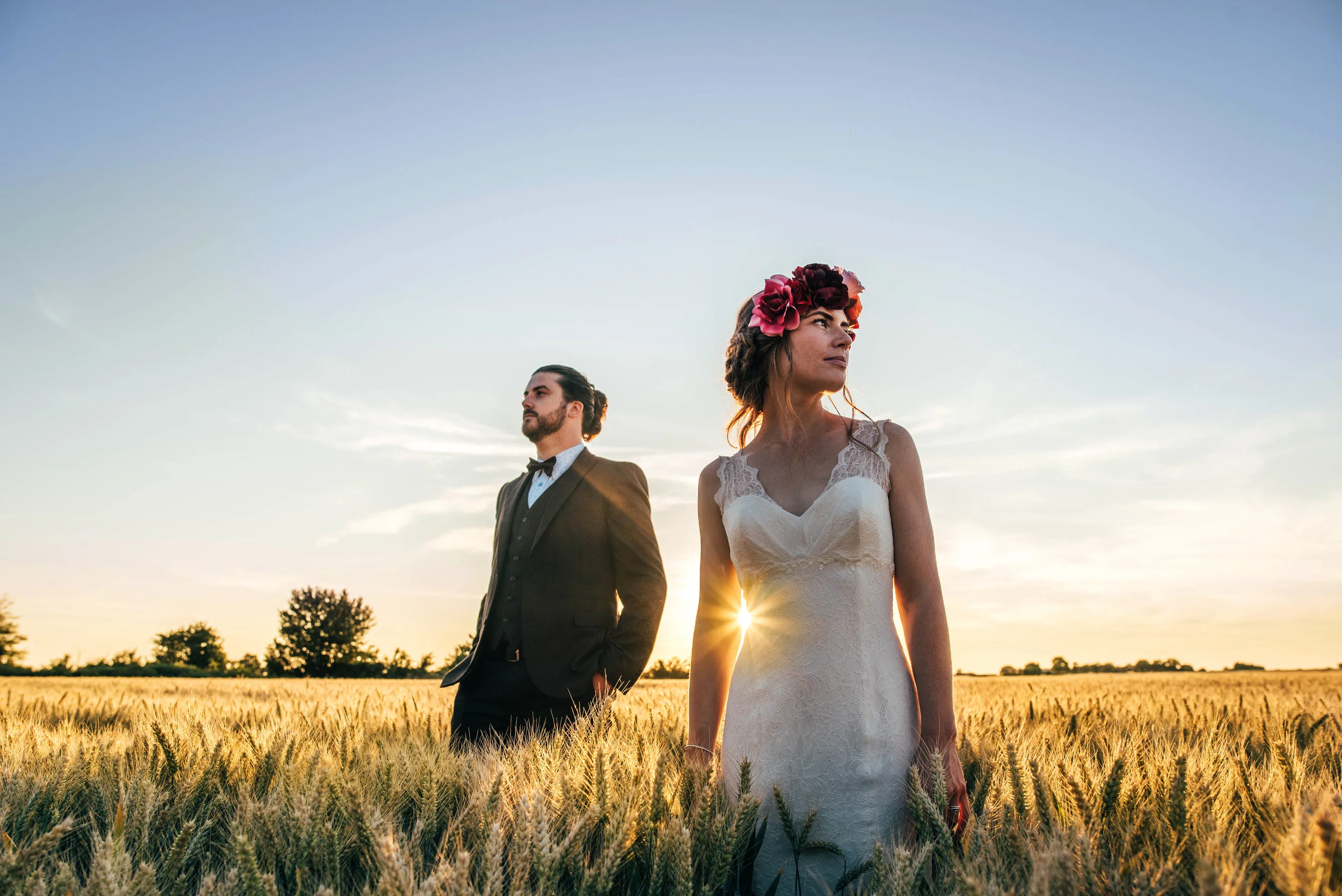 Bride and Groom in Cornfield at Sunset Houchins Essex Documentary Wedding Photographer