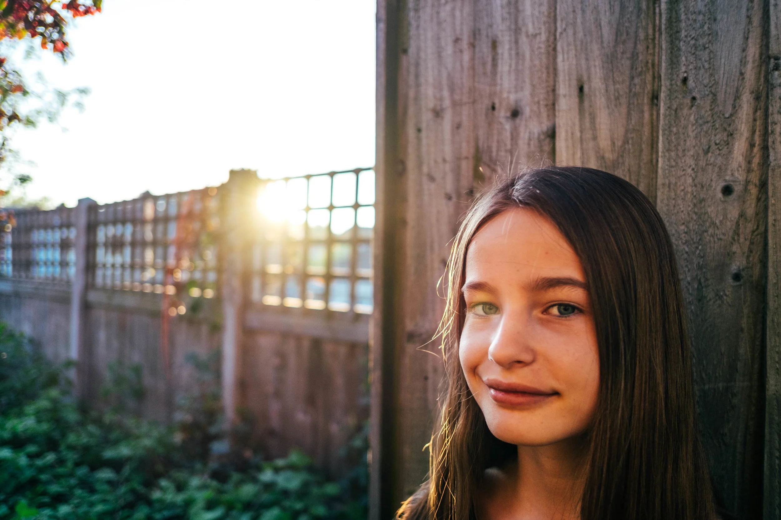 Tween girl in alleyway at sunset Essex Documentary Wedding and Family Photographer