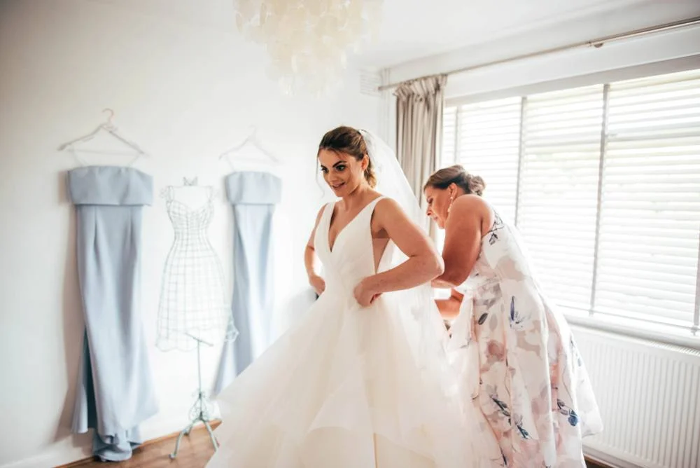 Rustic Summer wedding at Ratsbury Barn with Mini Golf, lawn games, pizza and home-made cake. Bride wears Mori Lee. Essex Documentary Wedding Photographer