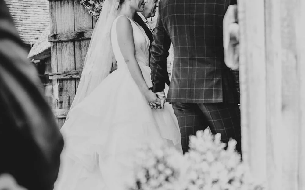 Rustic Summer wedding at Ratsbury Barn with Mini Golf, lawn games, pizza and home-made cake. Bride wears Mori Lee. Essex Documentary Wedding Photographer
