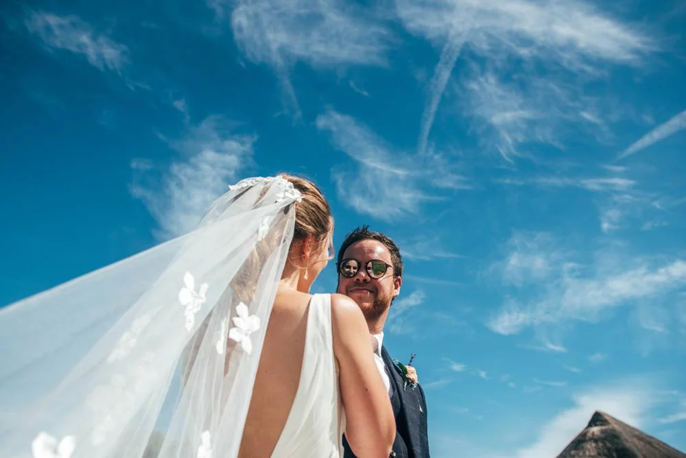 Rustic Summer wedding at Ratsbury Barn with Mini Golf, lawn games, pizza and home-made cake. Bride wears Mori Lee. Essex Documentary Wedding Photographer