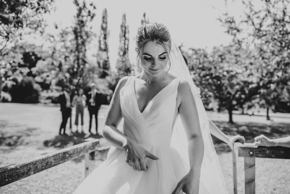 Rustic Summer wedding at Ratsbury Barn with Mini Golf, lawn games, pizza and home-made cake. Bride wears Mori Lee. Essex Documentary Wedding Photographer
