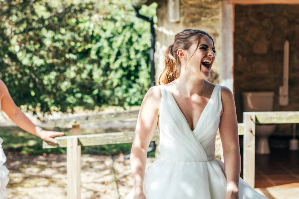 Rustic Summer wedding at Ratsbury Barn with Mini Golf, lawn games, pizza and home-made cake. Bride wears Mori Lee. Essex Documentary Wedding Photographer