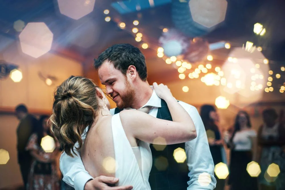 Rustic Summer wedding at Ratsbury Barn with Mini Golf, lawn games, pizza and home-made cake. Bride wears Mori Lee. Essex Documentary Wedding Photographer