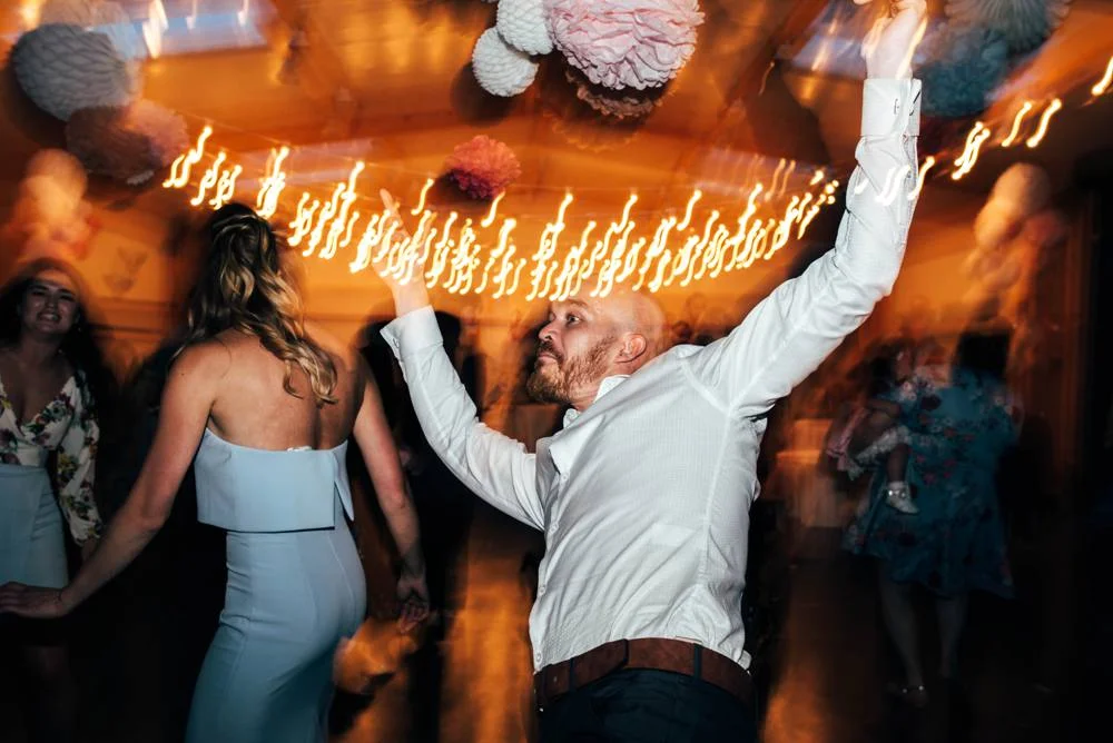 Rustic Summer wedding at Ratsbury Barn with Mini Golf, lawn games, pizza and home-made cake. Bride wears Mori Lee. Essex Documentary Wedding Photographer