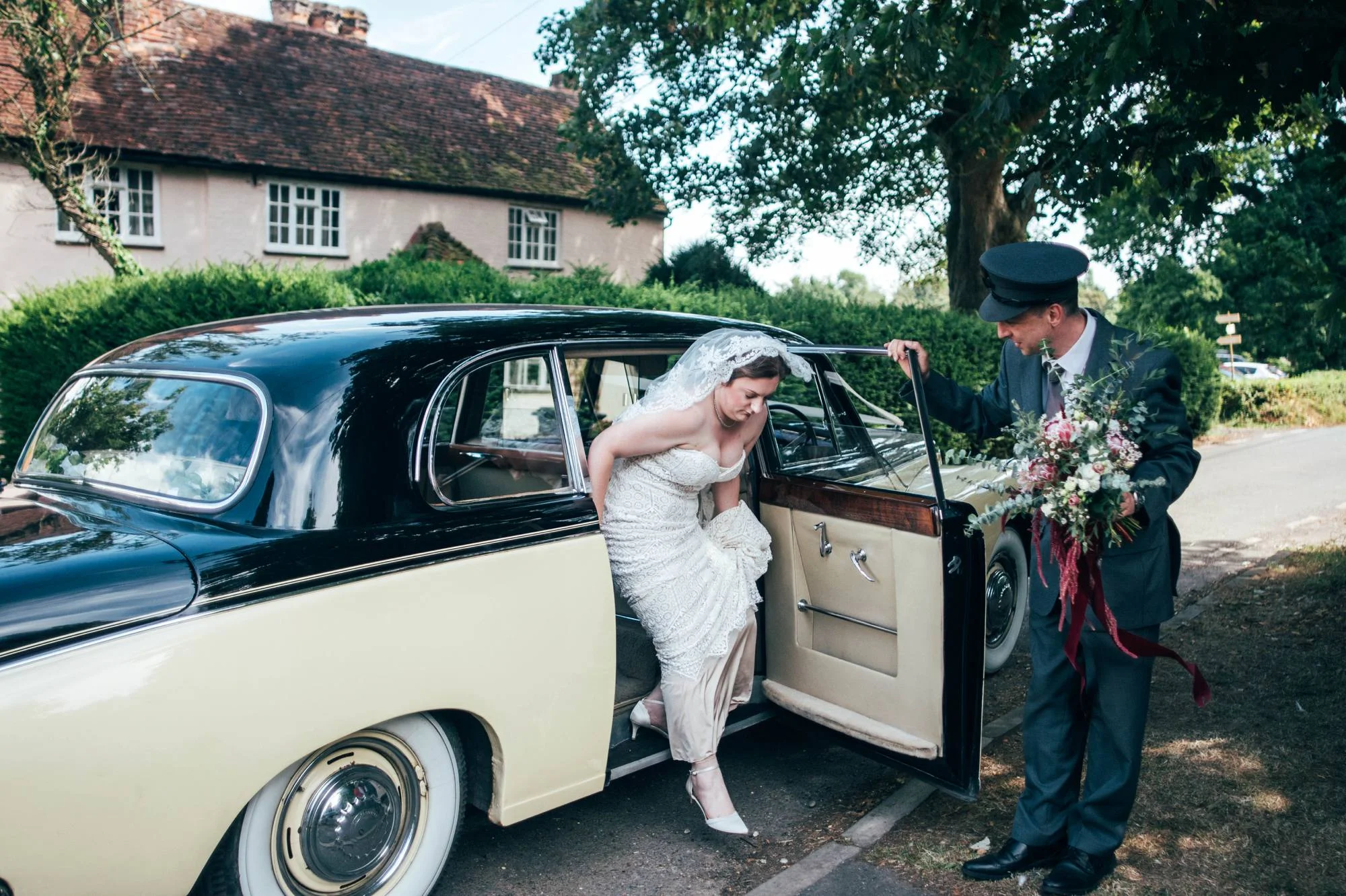 East Anglian Railway Museum Wedding. Vintage lace with Red &amp; Light Blue Palette with Proteas Bouquet. Essex Documentary Wedding Photographer