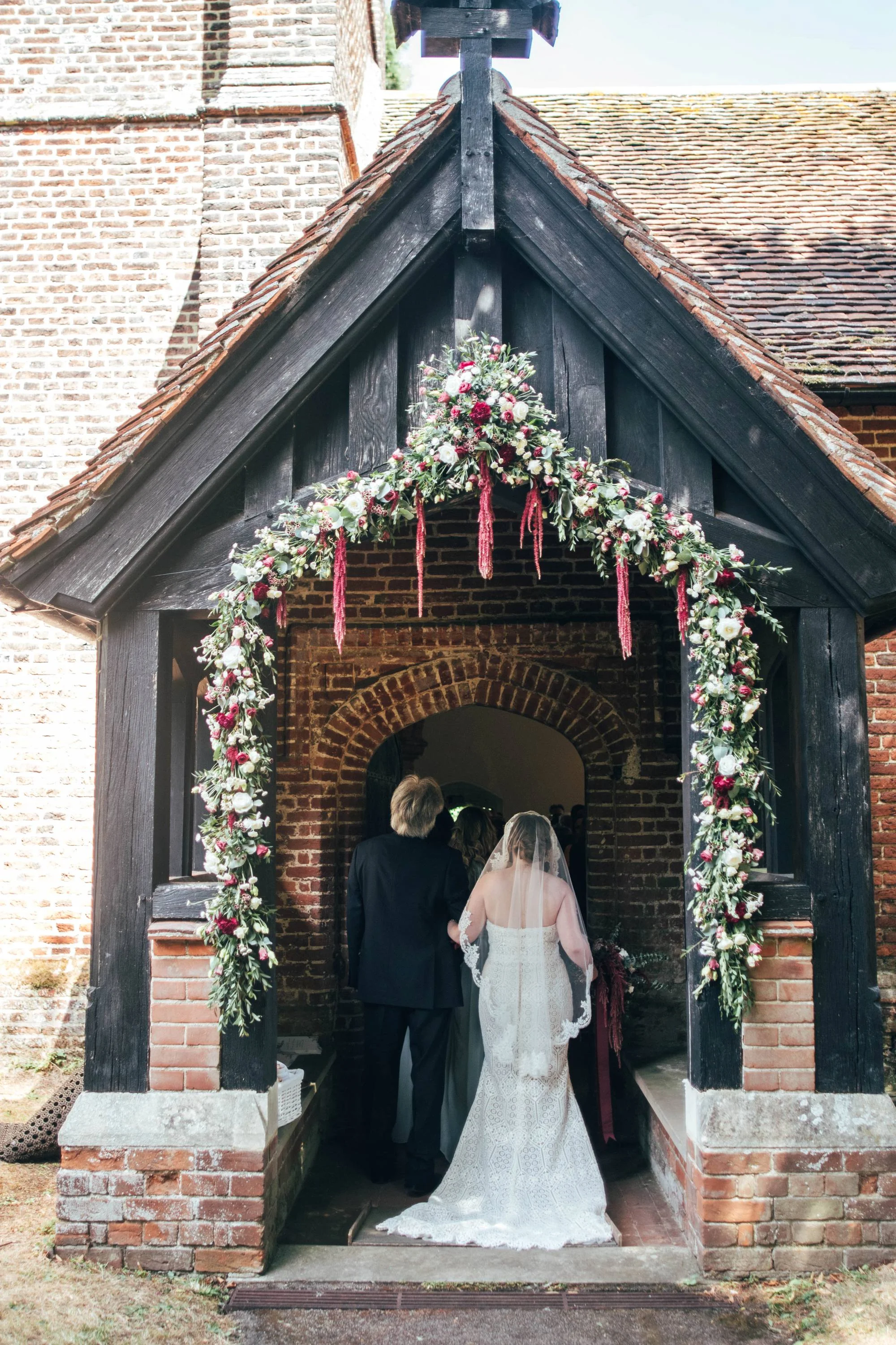East Anglian Railway Museum Wedding. Vintage lace with Red &amp; Light Blue Palette with Proteas Bouquet. Essex Documentary Wedding Photographer