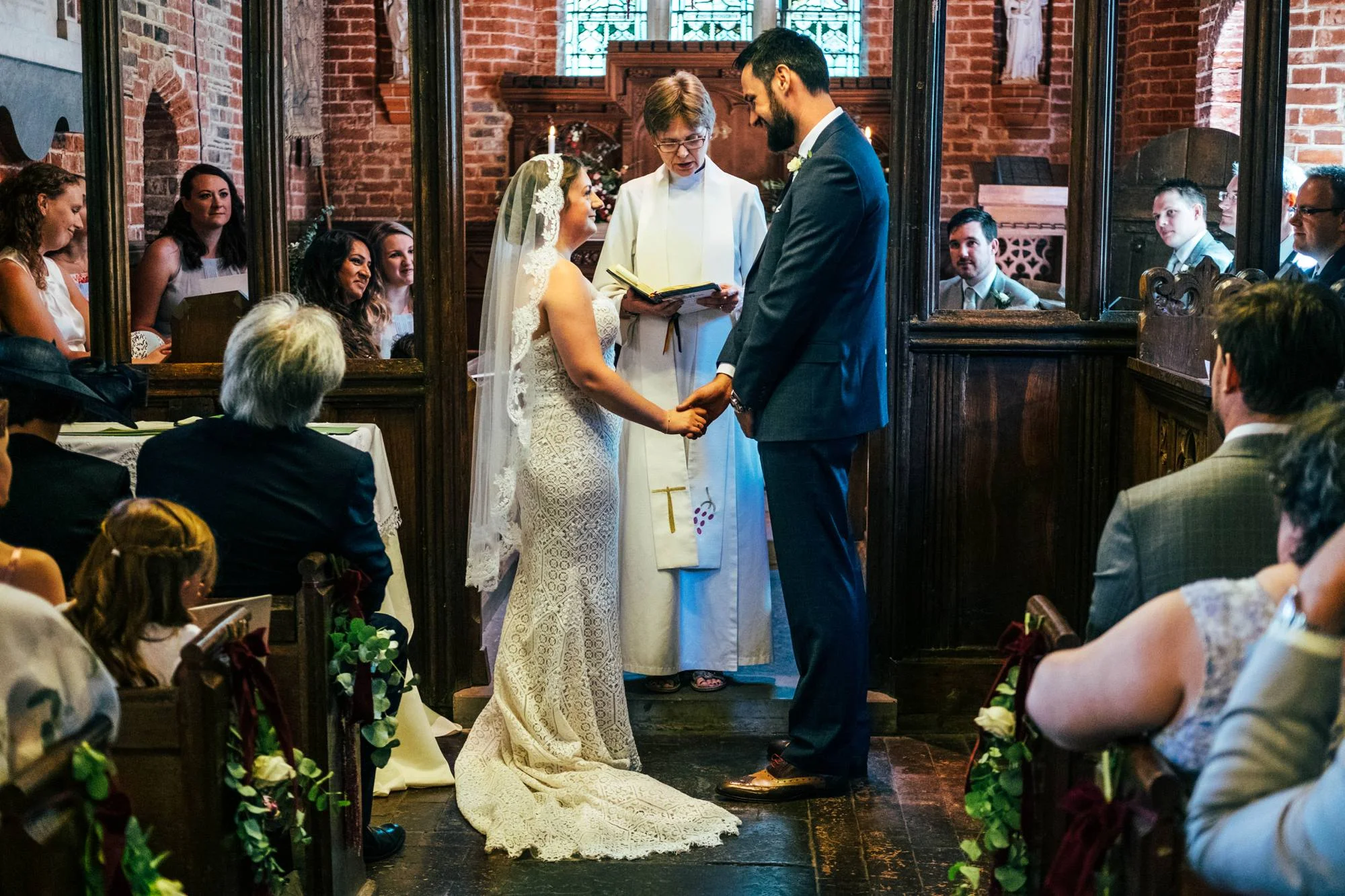 East Anglian Railway Museum Wedding. Vintage lace with Red &amp; Light Blue Palette with Proteas Bouquet. Essex Documentary Wedding Photographer