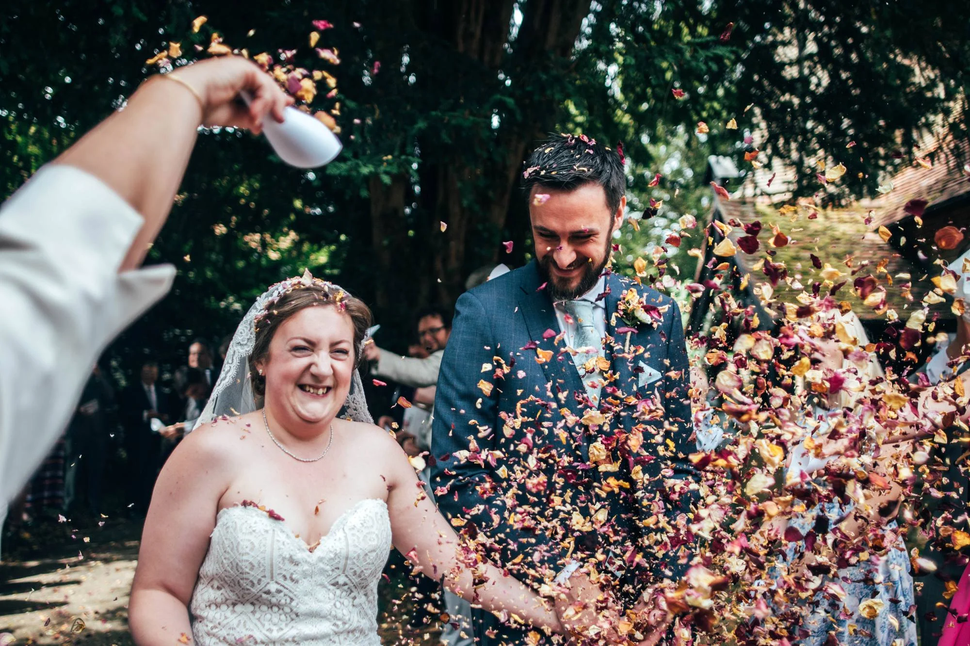 East Anglian Railway Museum Wedding. Vintage lace with Red &amp; Light Blue Palette with Proteas Bouquet. Essex Documentary Wedding Photographer