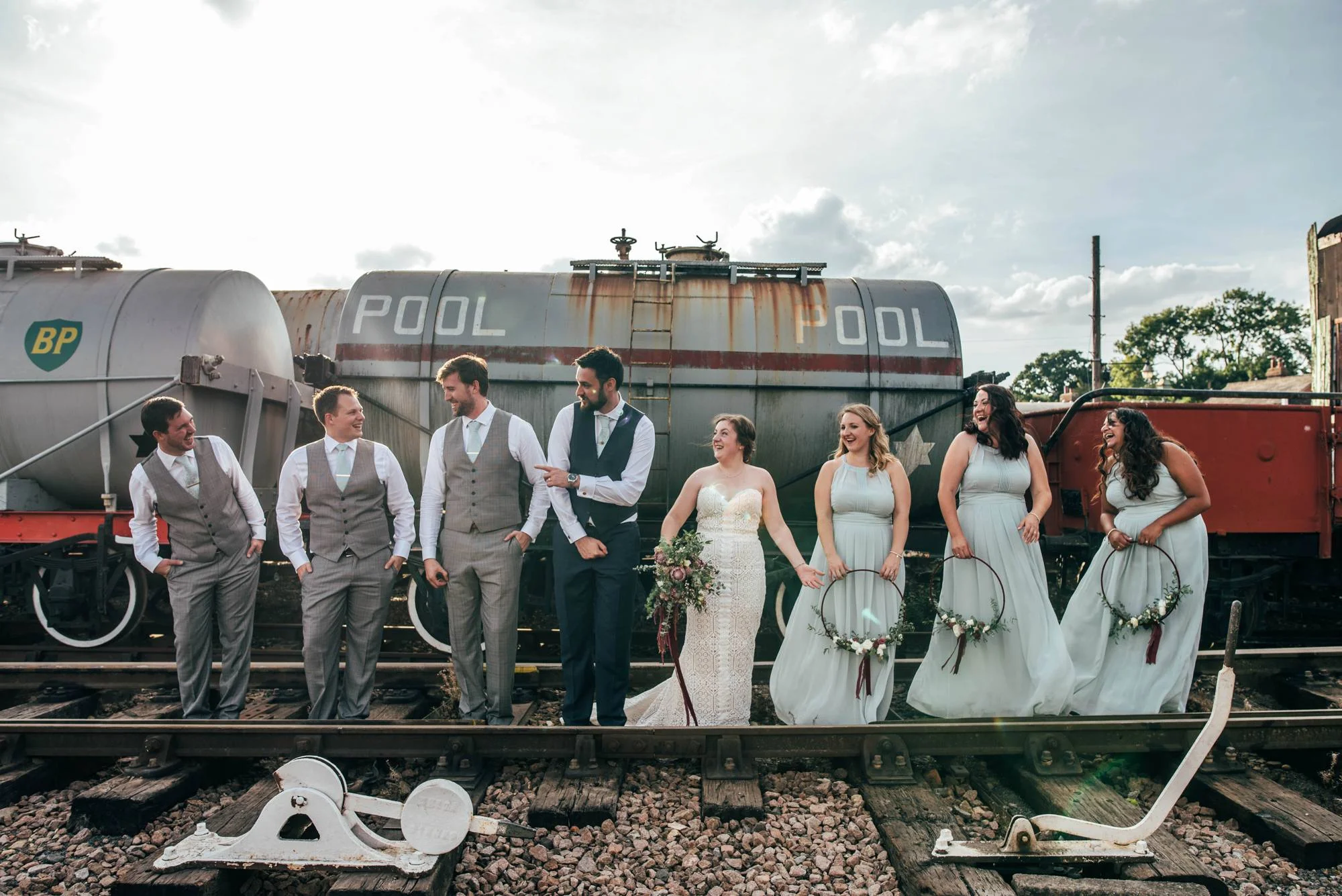 East Anglian Railway Museum Wedding. Vintage lace with Red &amp; Light Blue Palette with Proteas Bouquet. Essex Documentary Wedding Photographer