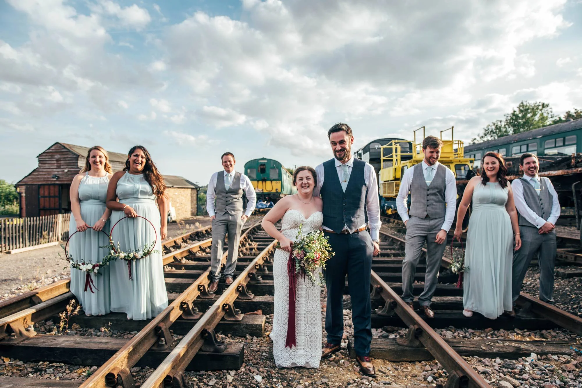 East Anglian Railway Museum Wedding. Vintage lace with Red &amp; Light Blue Palette with Proteas Bouquet. Essex Documentary Wedding Photographer