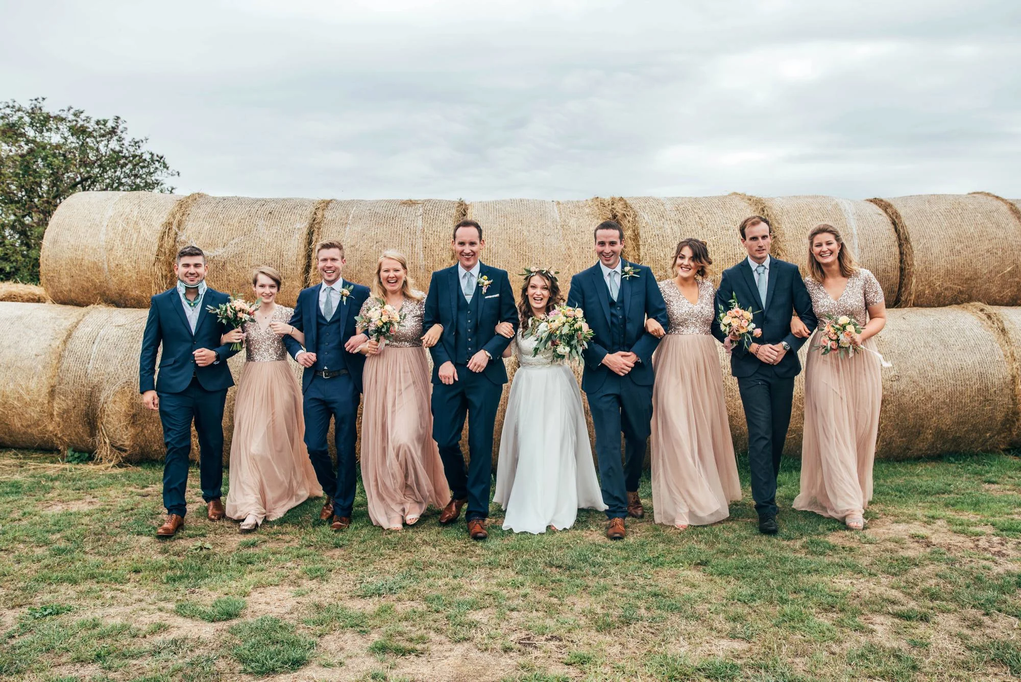 Ely Cathedral with a DIY, Boho Farm Wedding Reception at Bedingham's Farm , Bride wears Willowby by Watters and a Flower Crown. Essex Documentary Wedding Photographer.