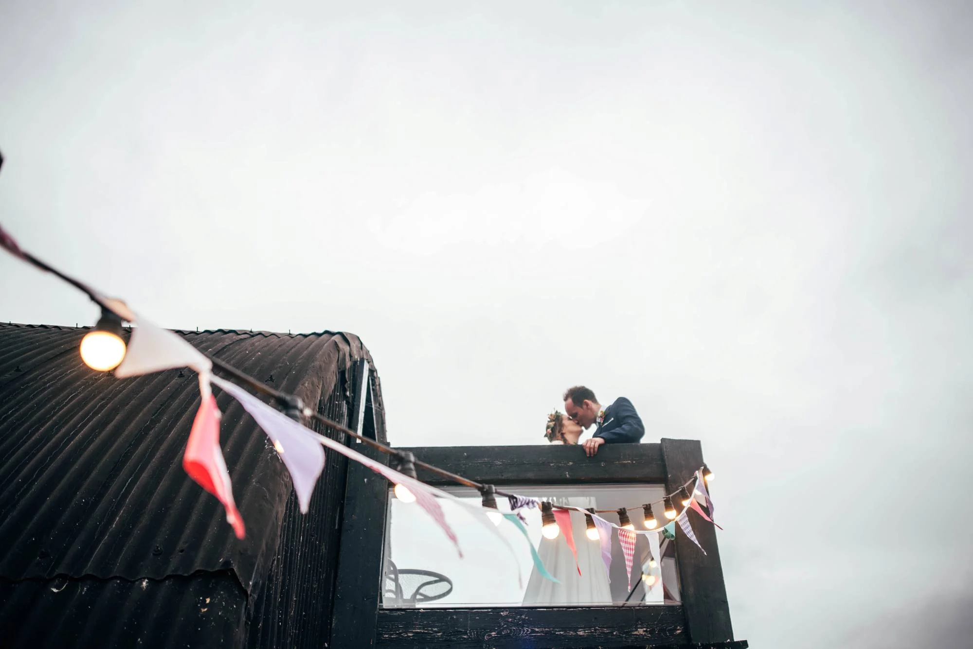Ely Cathedral with a DIY, Boho Farm Wedding Reception at Bedingham's Farm , Bride wears Willowby by Watters and a Flower Crown. Essex Documentary Wedding Photographer.