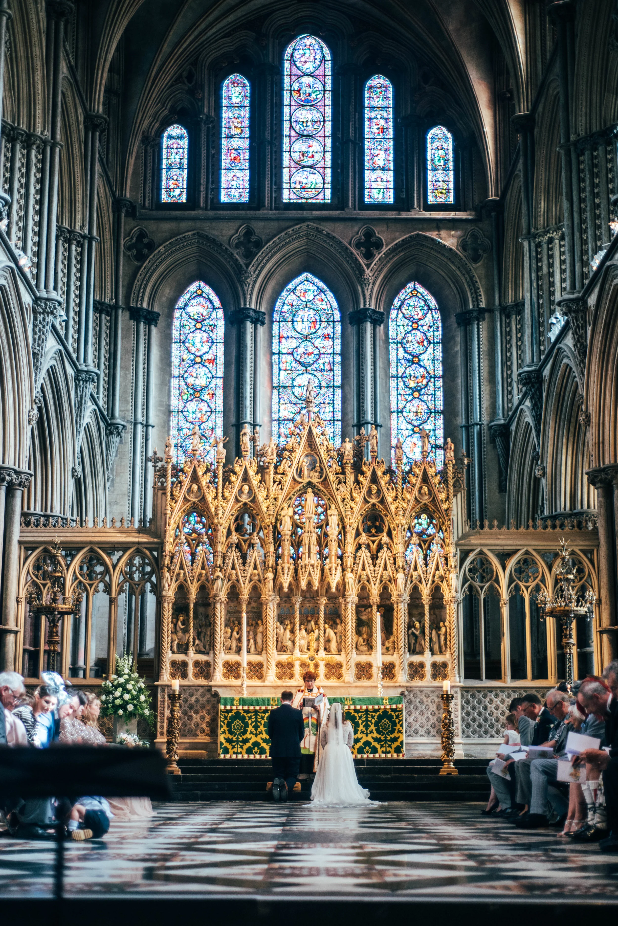 Bride and Groom during ceremony at Ely Cathedral, Essex Documentary Wedding Photographer