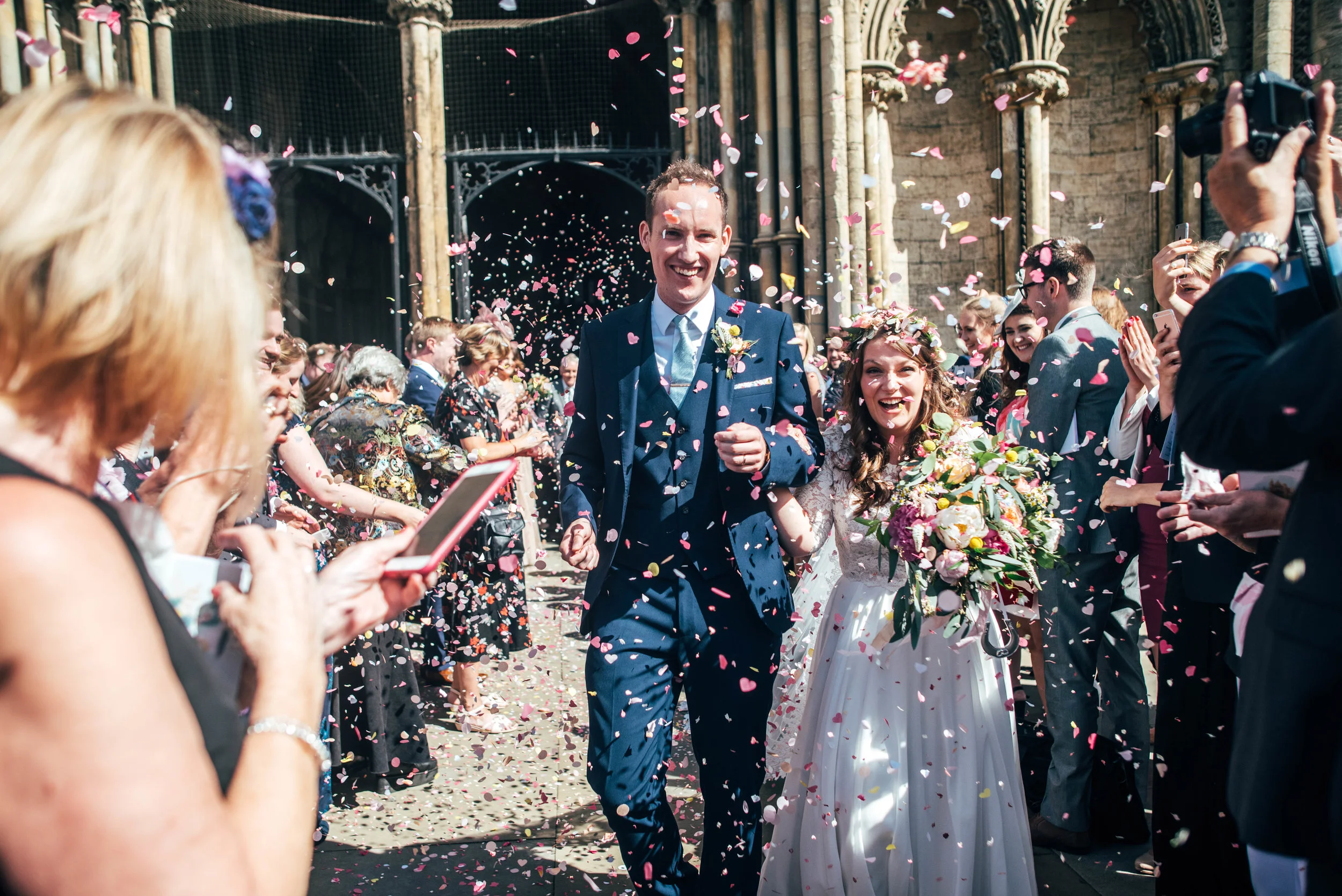 Confetti for Bride and Groom at Ely Cathedral, Essex Documentary Wedding Photographer