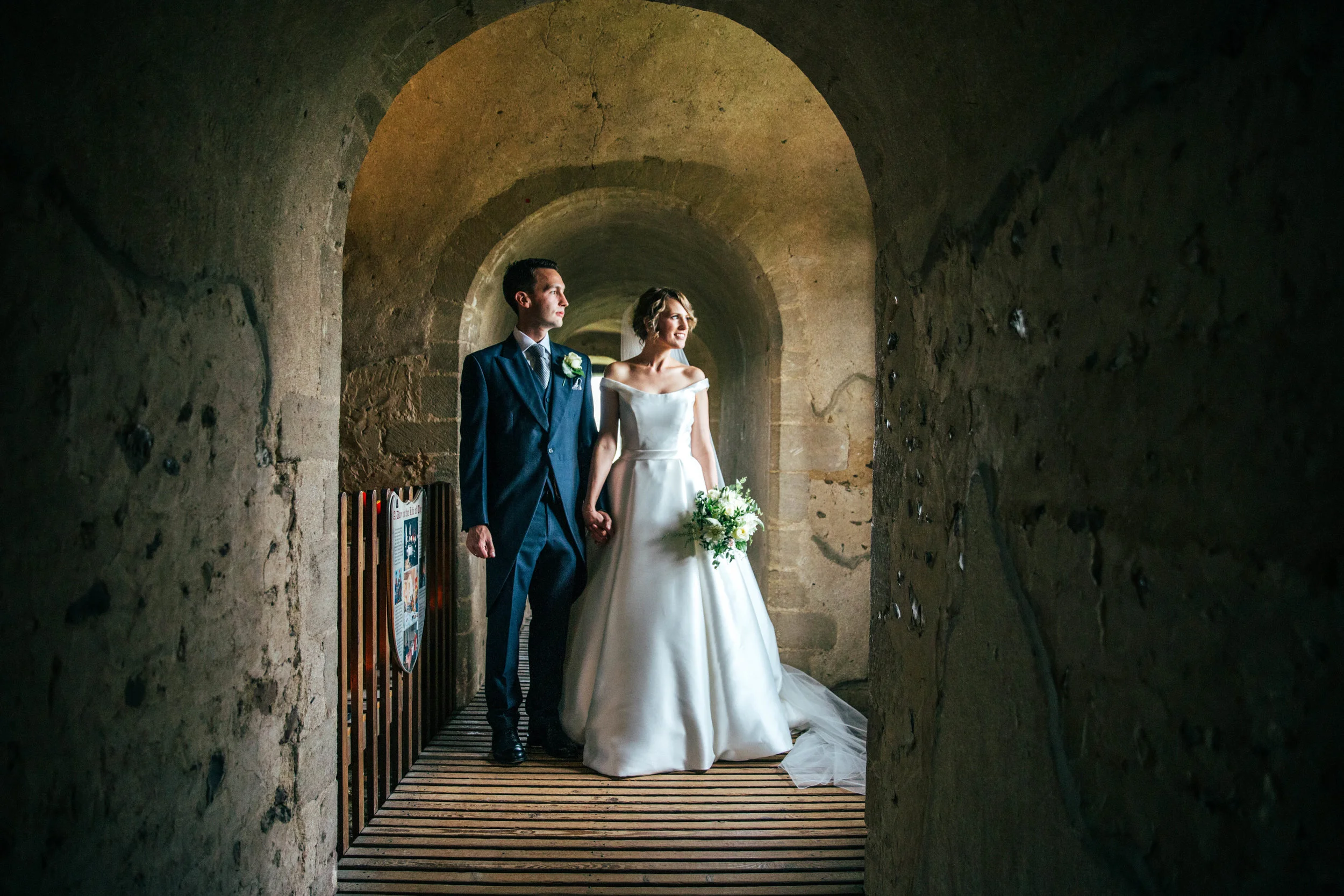 Bride and Groom at Hedingham Castle.  Essex Documentary Wedding Photographer