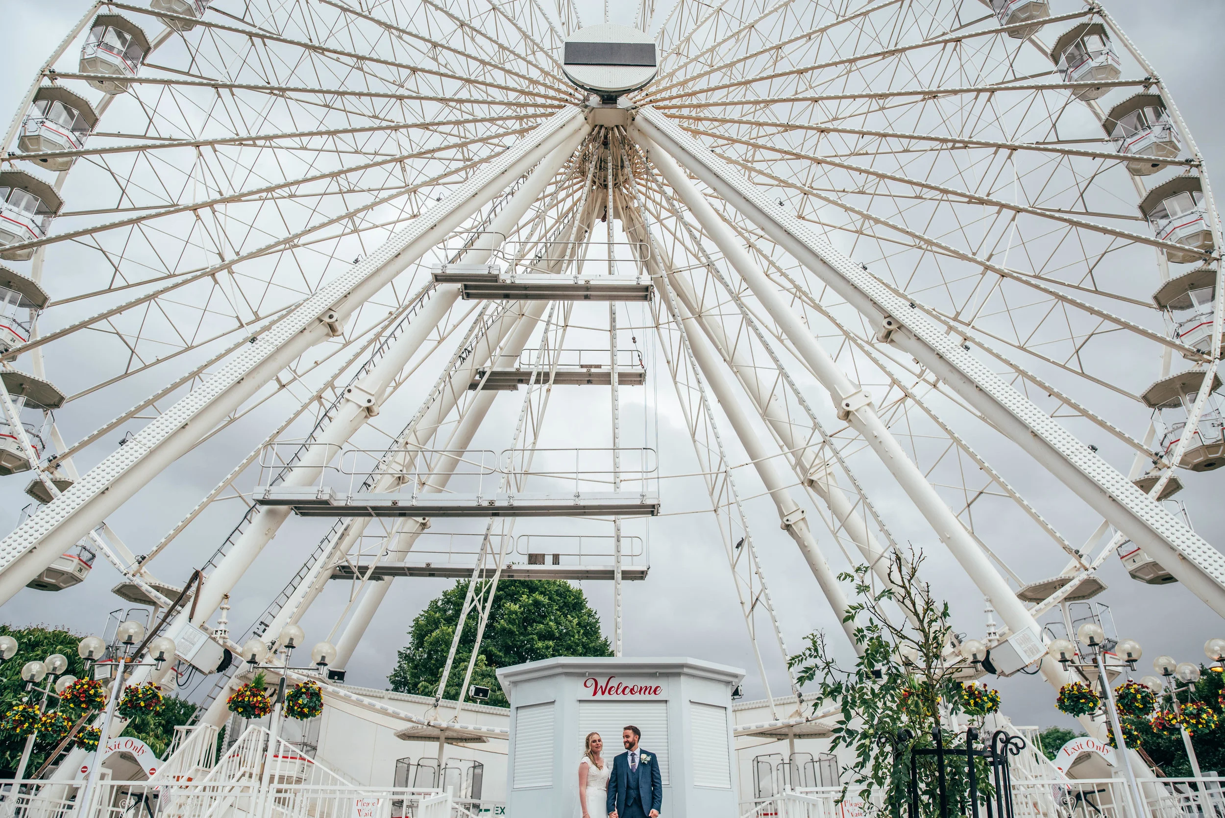 Bride and Groom in front of Big Wheel, Essex Documentary Wedding Photographer