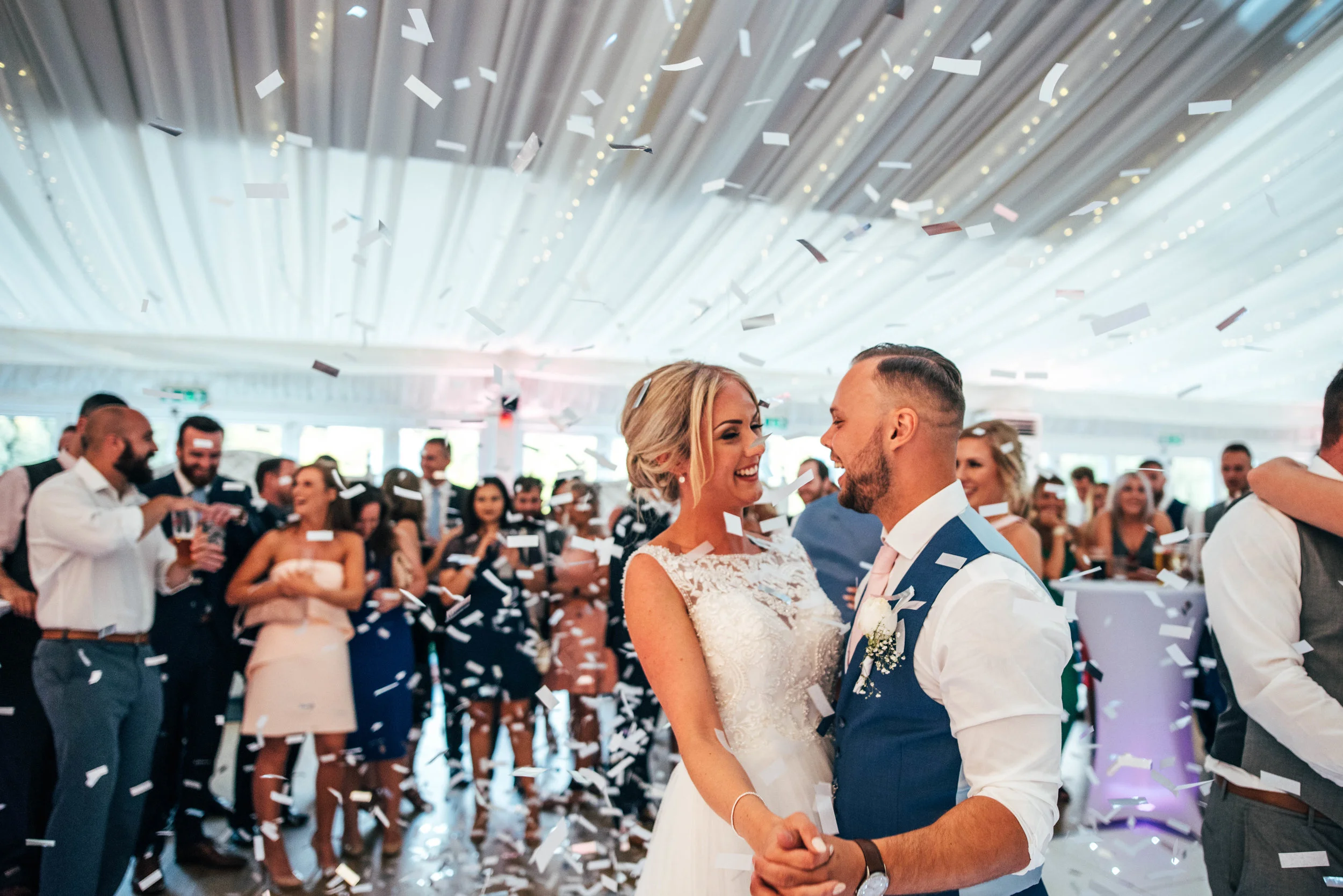 Bride and Groom First Dance Confetti Canon at Parklands, Quendon Hall, Essex Documentary Wedding Photographer