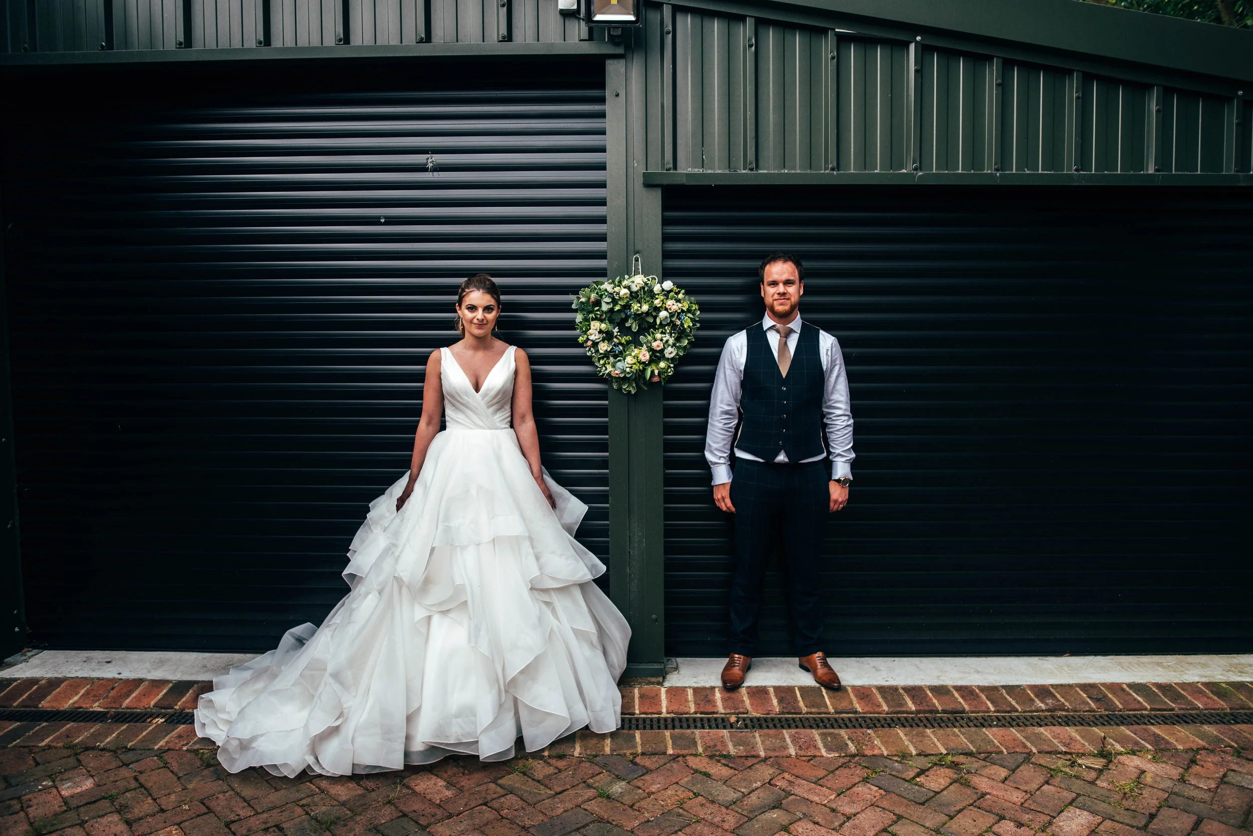 Bride and Groom in Warehouse after Ratsbury Barn Wedding Essex Documentary Wedding Photographer