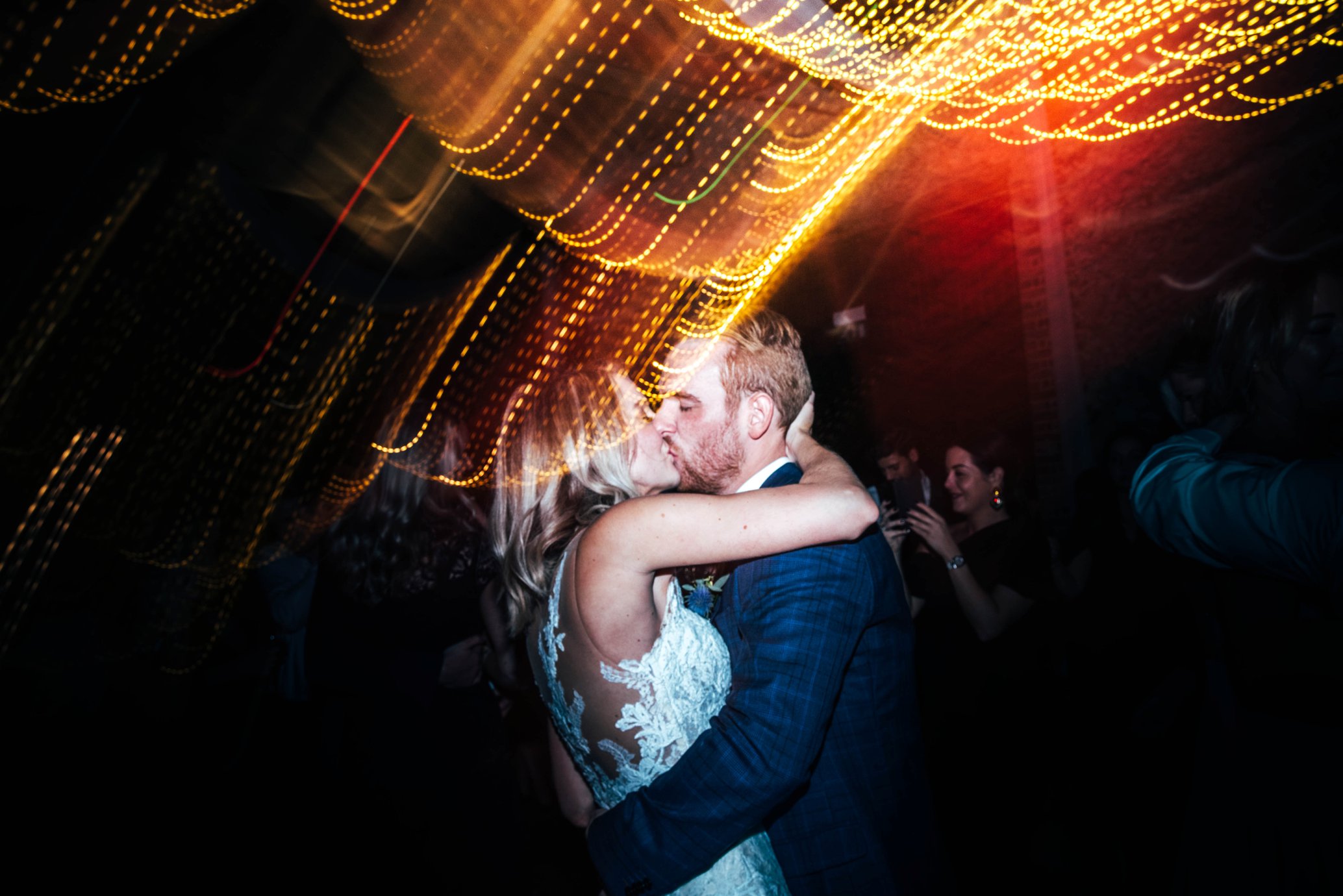 Nathalie &amp; Kieron, an Autumn Barn Wedding at The Granary Estates with Champagne Golds, Greens and Fairy lights. Groom in Navy Check.