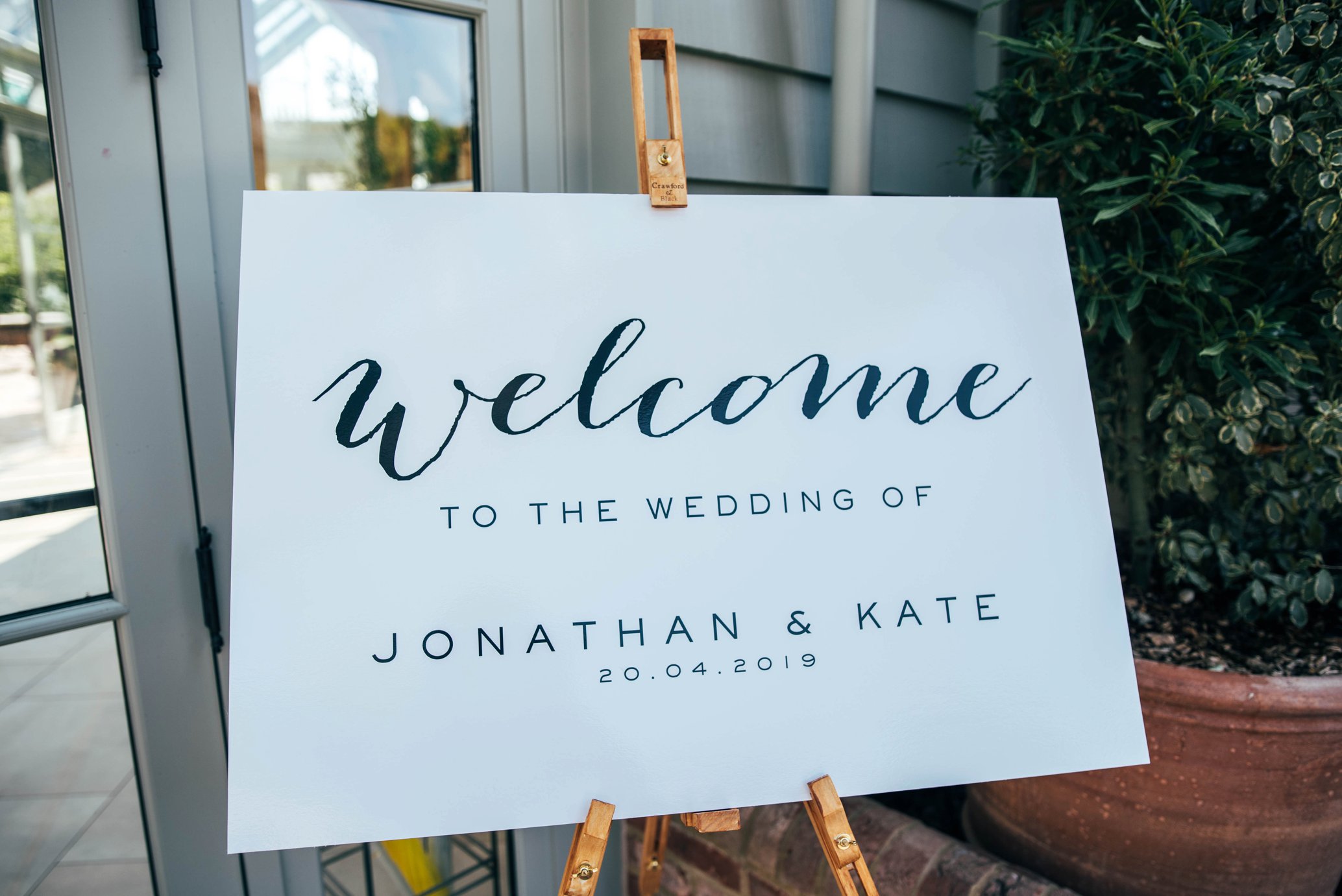 Greens &amp; Whites for an Elegant Easter Wedding at Gate Street Barn with favours of Olive Oil from Bride's family house in France. Bride wears Watters. Essex Documentary Wedding Photographer.
