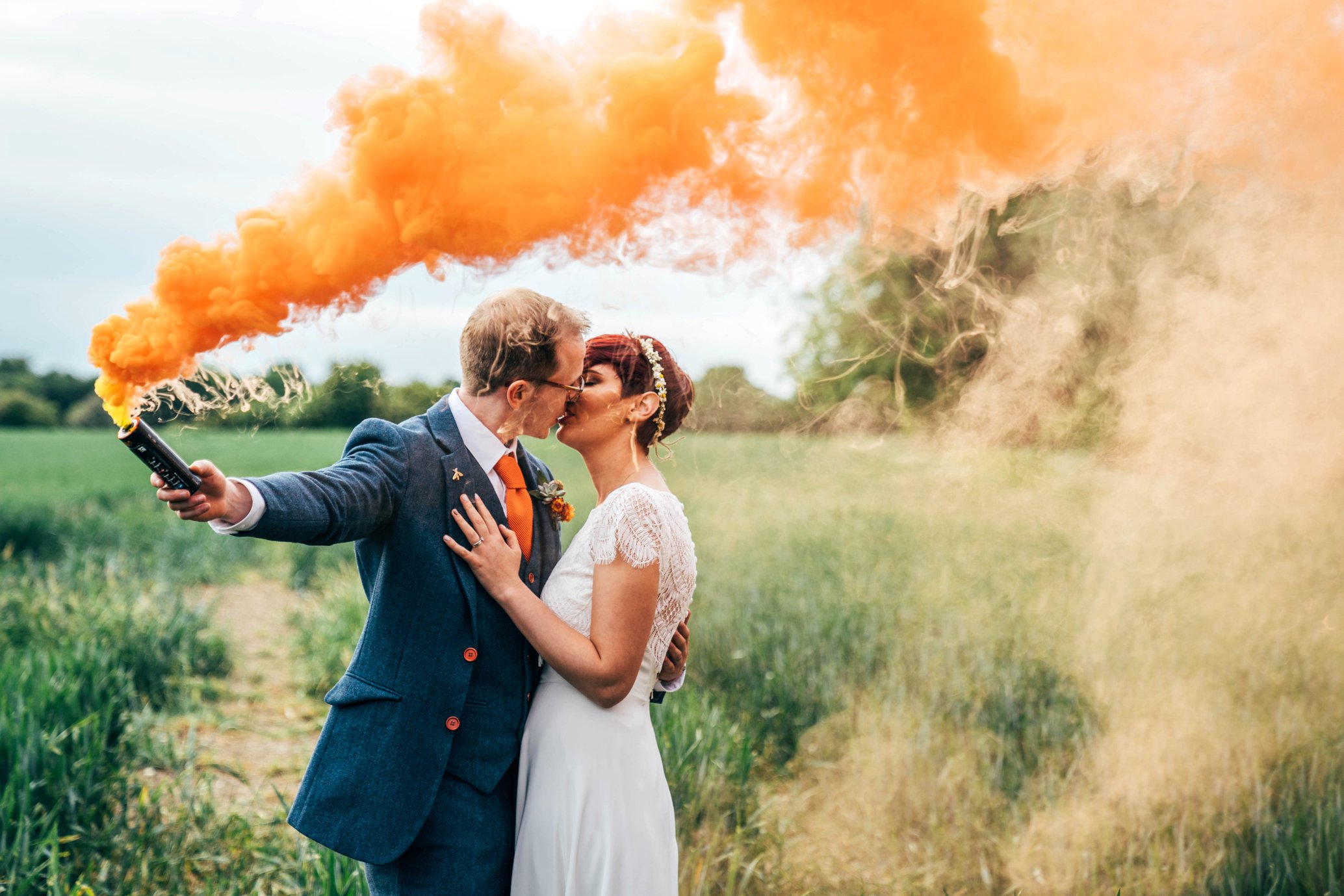 DIY Village Hall Outdoor Wedding Flower Arc Camper Pizza Van Orange smoke bombs dip dye wedding dress Essex Documentary Wedding Photographer
