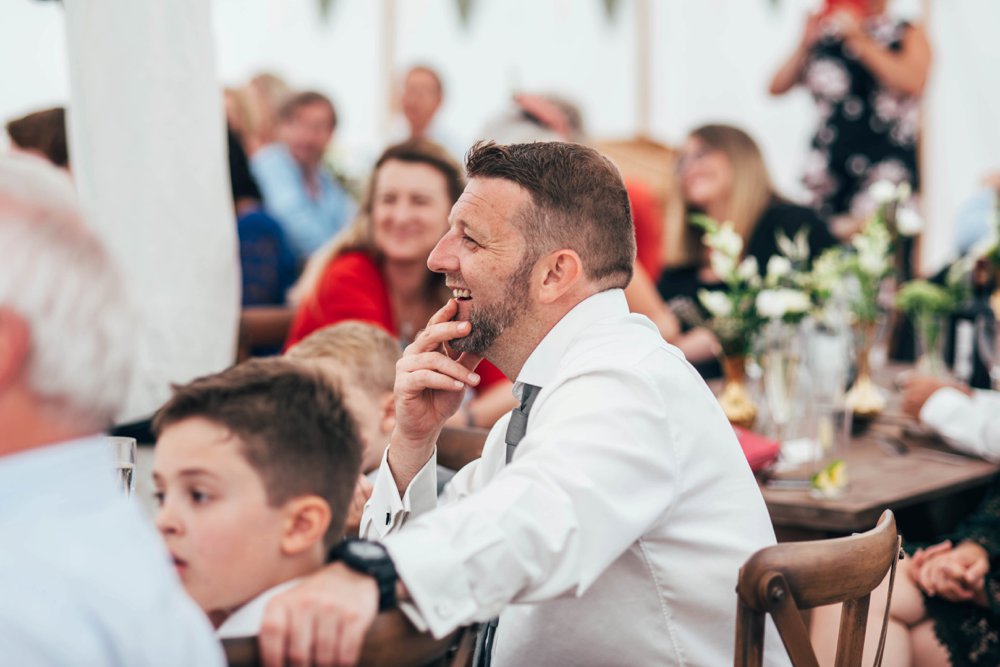 A Sage, Grey &amp; White Festival Wedding with Brass detail at Lodge Farm, Lindsey. Tattooed Bride and Dog in a bow tie. Essex Documentary Wedding Photographer