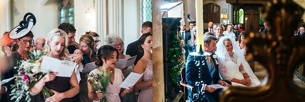 Autumn Lilacs for a DIY Back Garden Wedding at Home with Wild Flowers and Rustic Detail. Essex Documentary Wedding Photographer.