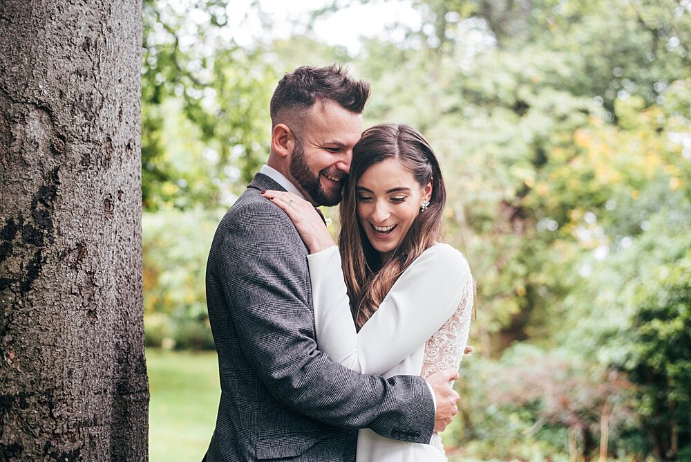 Deep Reds &amp; Tea Cup Piggies for a Rainy, Autumn wedding at Blake Hall. Essex Documentary Wedding Photographer 