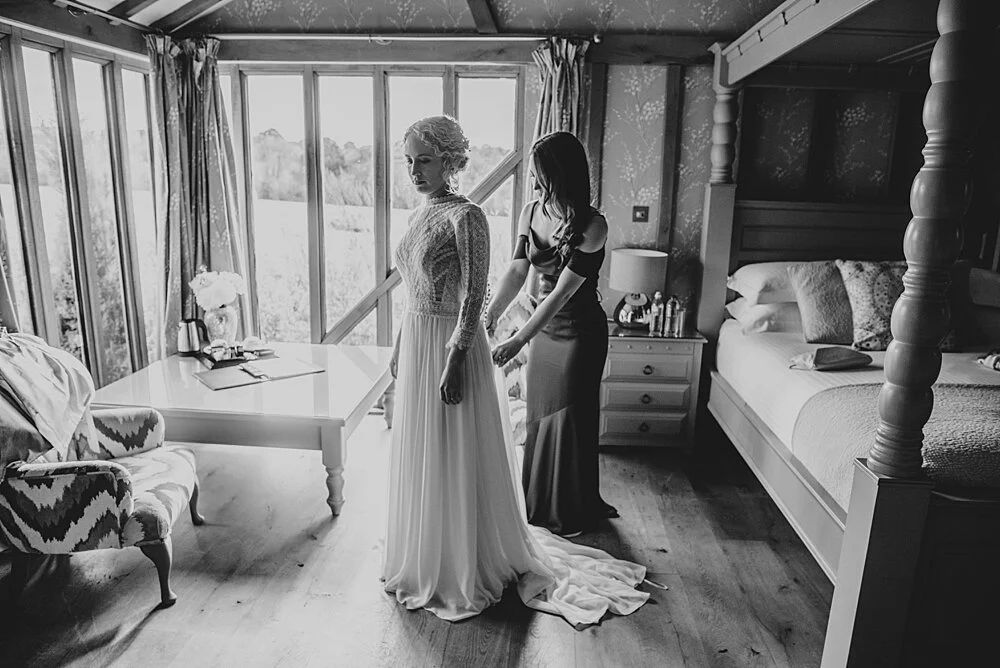 Autumn barn wedding at Crondon Park with rich reds and an ethereal Pronovias gown with Game of Throne vibes! Essex Documentary Wedding Photographer